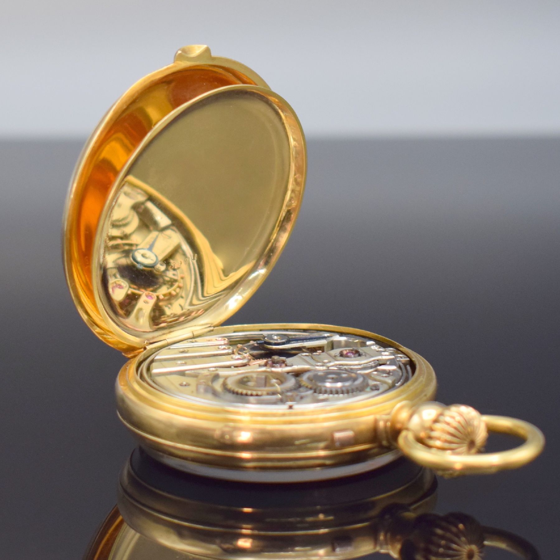 Detail e: Feine offene Taschenuhr m. 1/4 Stunden- Repetition in GG 750/000, Schweiz um 1880, 2-Deckel Goldgeh. m. a-goutte Schlüssen dell., Rückdeckel mit ...