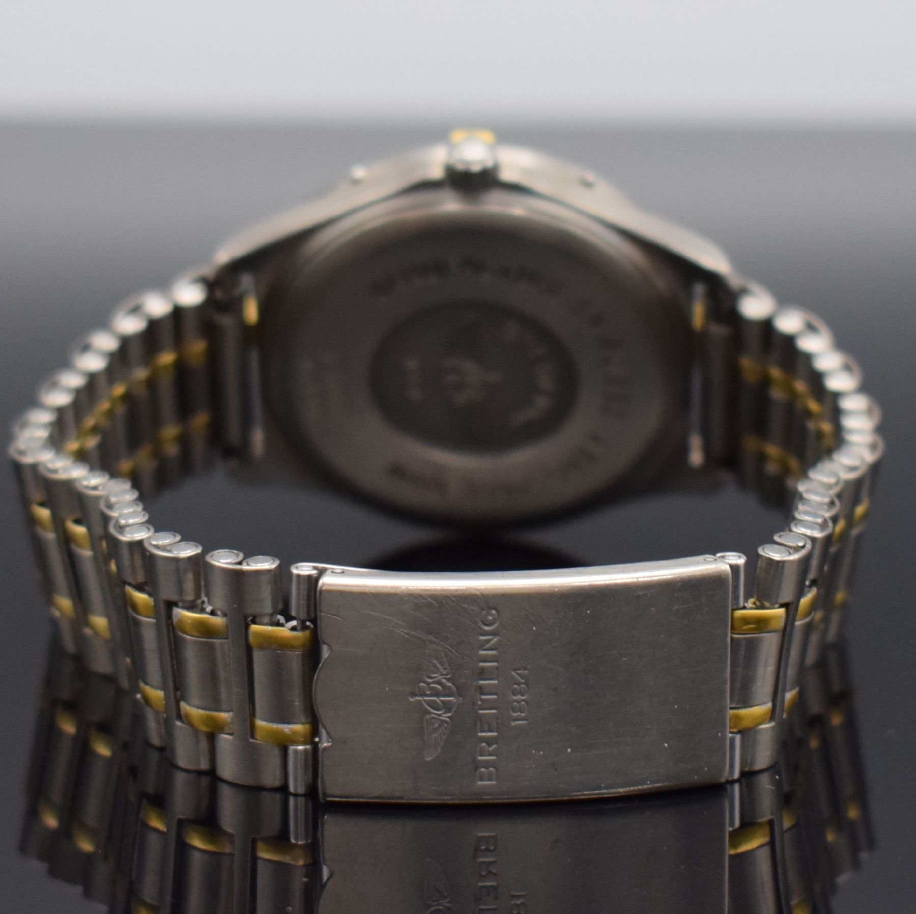 Detail f: BREITLING Aerospace Multifunktionsuhr in Titan/Gold Ref. F56062, Schweiz lt. orig. Papier verkauft 1995, quarz, satiniertes gedr. Geh., eins. drehb. ...