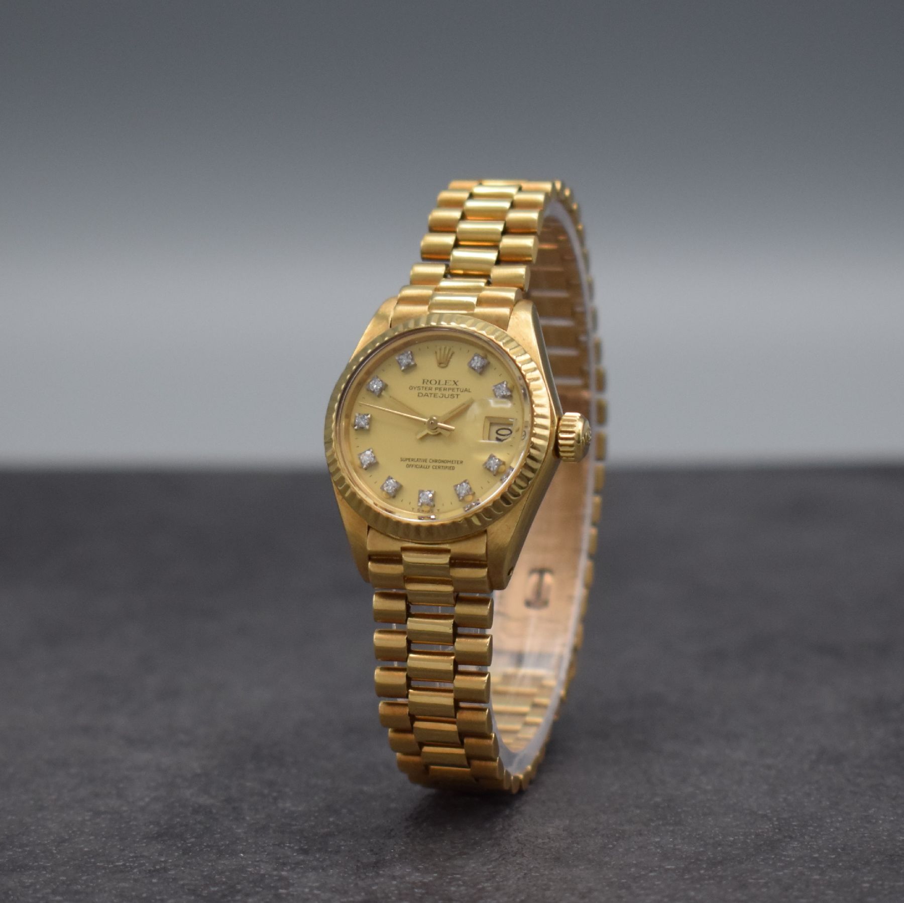 Detail b: ROLEX Datejust Damenarmbanduhr in GG 750/000, Schweiz um 1980, Automatik, Ref. 6917, verschr. Oystergehäuse inkl. Presidentband m. Faltschl., gold. ...
