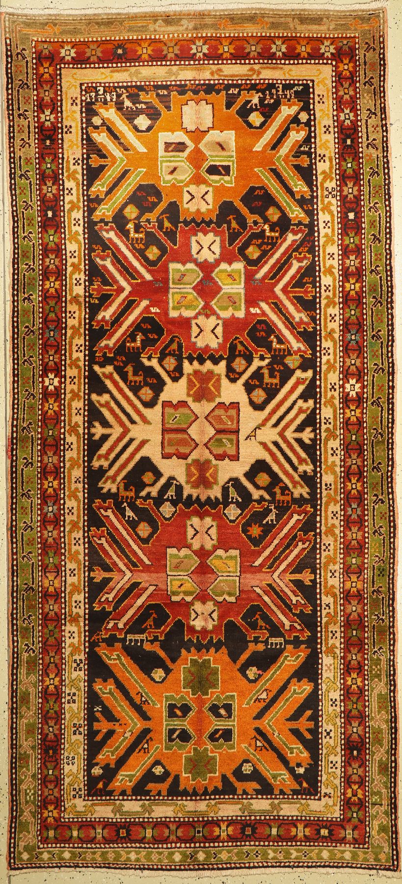 Adler Kazak alt, Kaukasus, ca. 50 Jahre, Wolle auf Baumwolle, ca. 292 x 133 cm, EHZ: 2,(gereinigt)