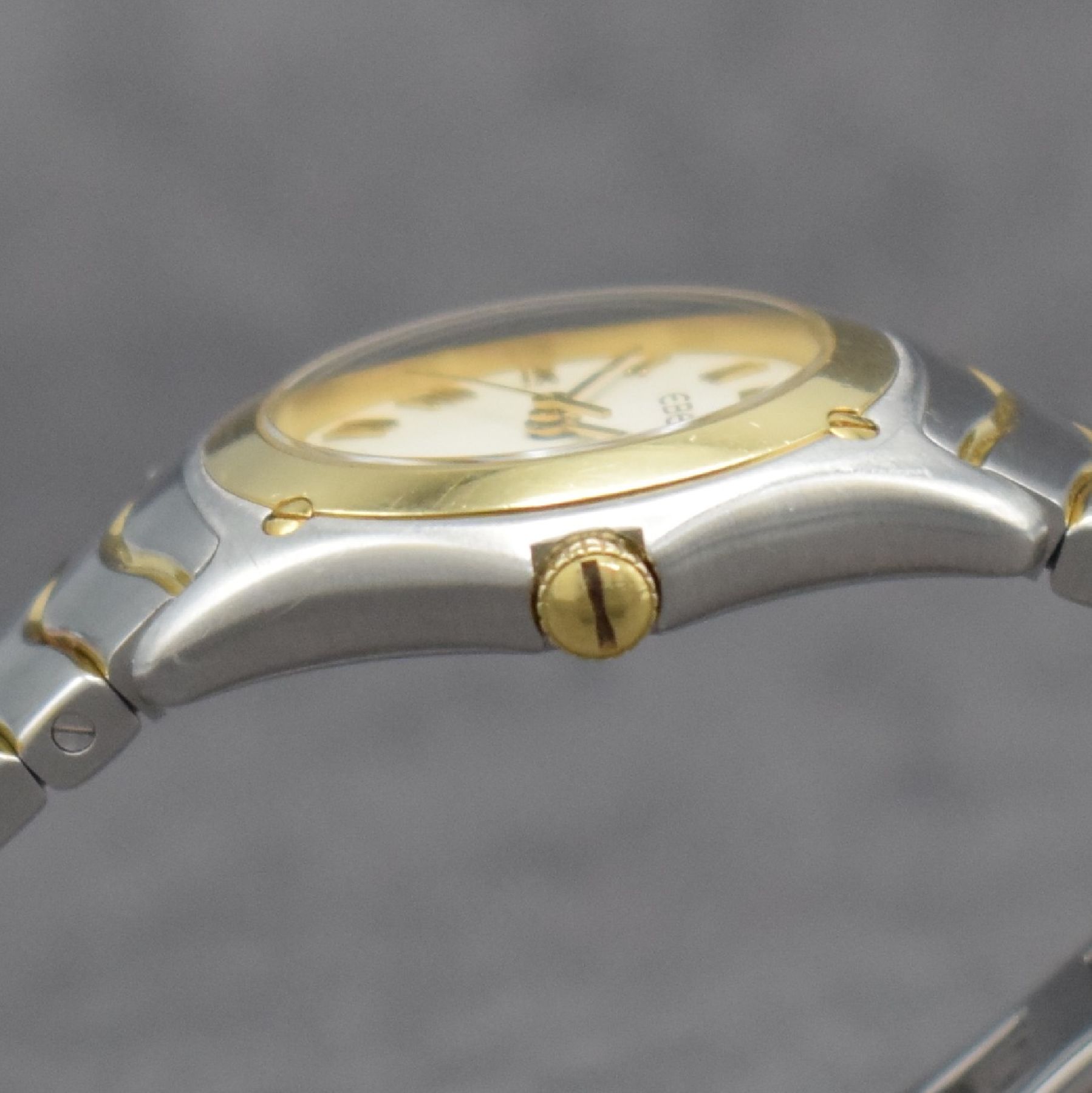Detail f: EBEL Sport Classique Damenarmbanduhr, Schweiz um 2005, quarz, Edelstahlgeh. mit Goldlünette, Gliederband m. dopp. Faltschl., cremefarb. Zifferbl. m. ...