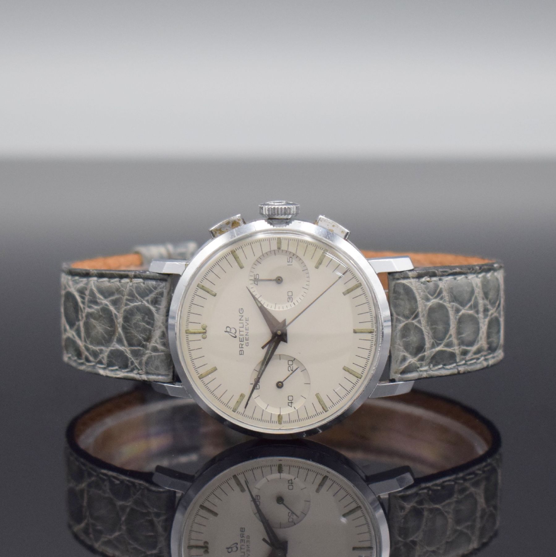 BREITLING GENEVE Armbandchronograph Ref. 1199, Schweiz um 1965, Handaufzug, verchromtes Geh., gedr. Stahlboden, orig. Krone, silb. Zifferbl., ...