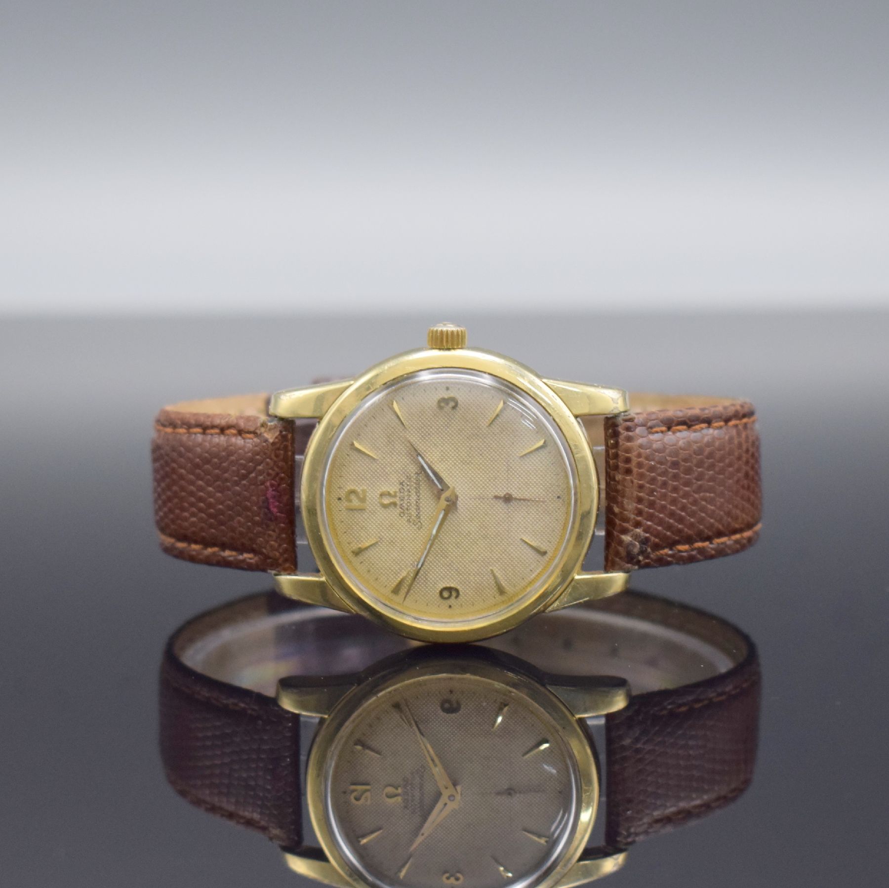 OMEGA Seamaster Ref. 2875-1 Armbanduhr in Stahl mit Goldhaube, Schweiz um 1961, Automatik, verschr. Geh., Boden m. Seamaster- Logo, guill. Zifferbl. ...
