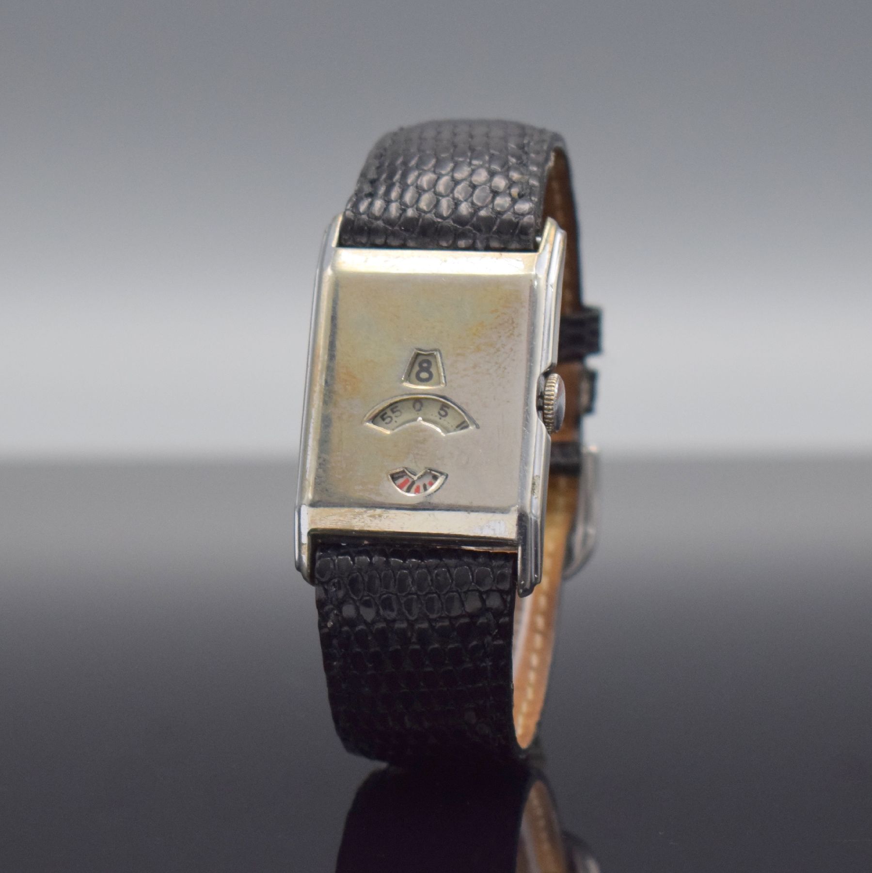 Detail b: JUVENIA rechteckige Armbanduhr mit digitaler Anzeige, Schweiz um 1935, verchr. Nickelgeh., gestufte Seite, digitale Anzeige von Std., Min. & Sekunde, ...