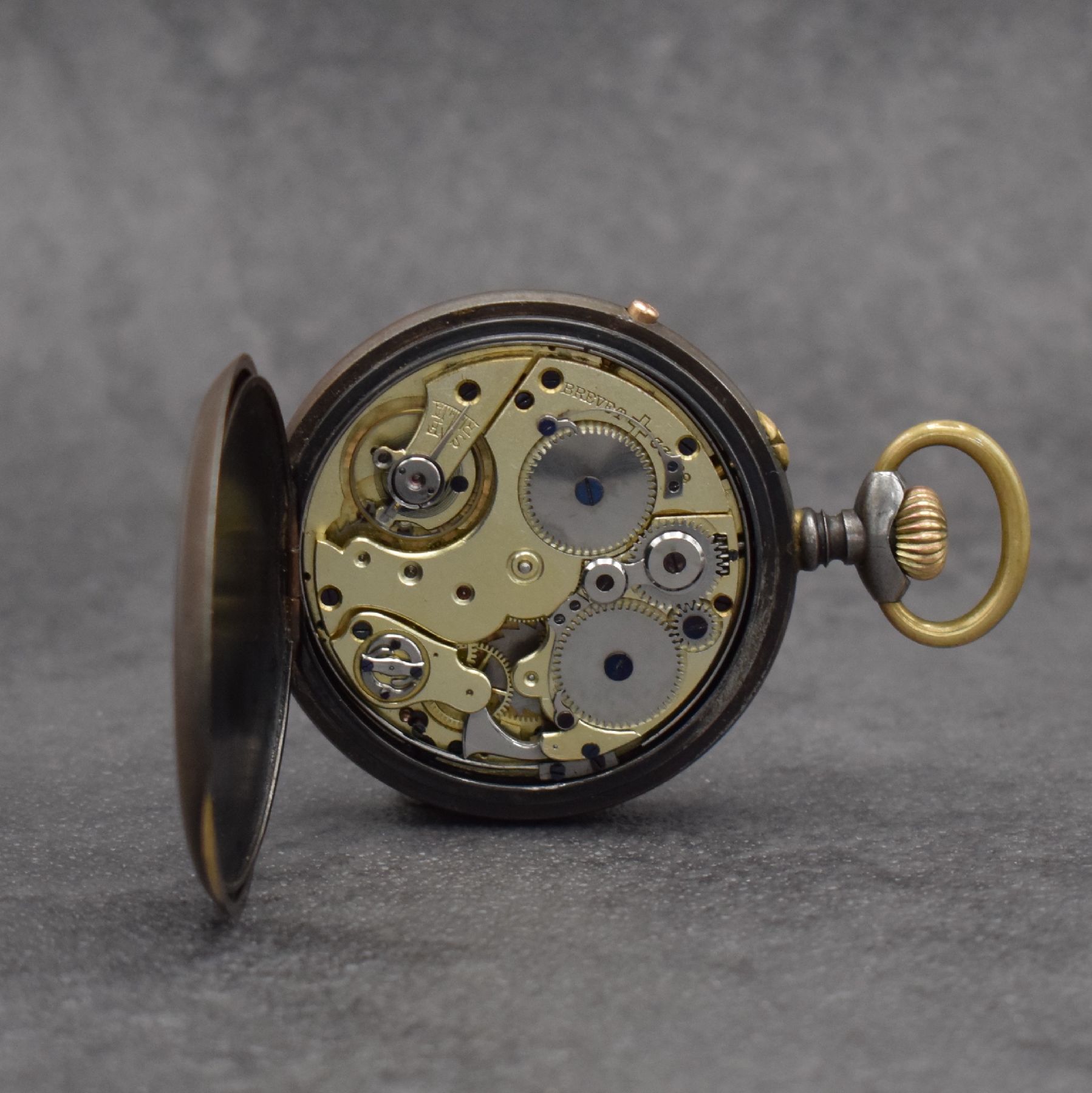 Detail e: Eisentaschenuhr mit 1/2-Stunden-Selbstschlag & Stunden-Repetition, Schweiz um 1900, offenes brüniertes Geh., Rep.-Drücker b. 2, ...