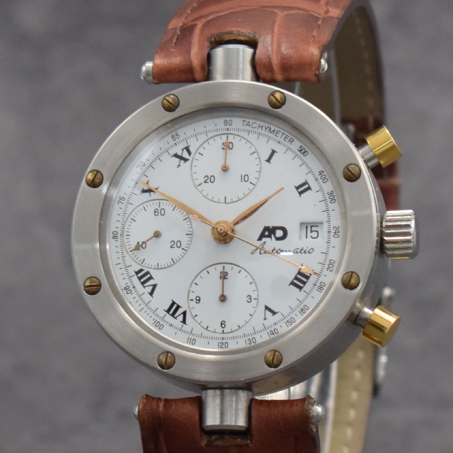 Detail c: AD ausgefallener Chronograph in Edelstahl, Schweiz um 2000, Automatik, 3-teil. verschr. Gehäuse, beids. vergl., Drücker verg., weißes Zifferbl. m. ...