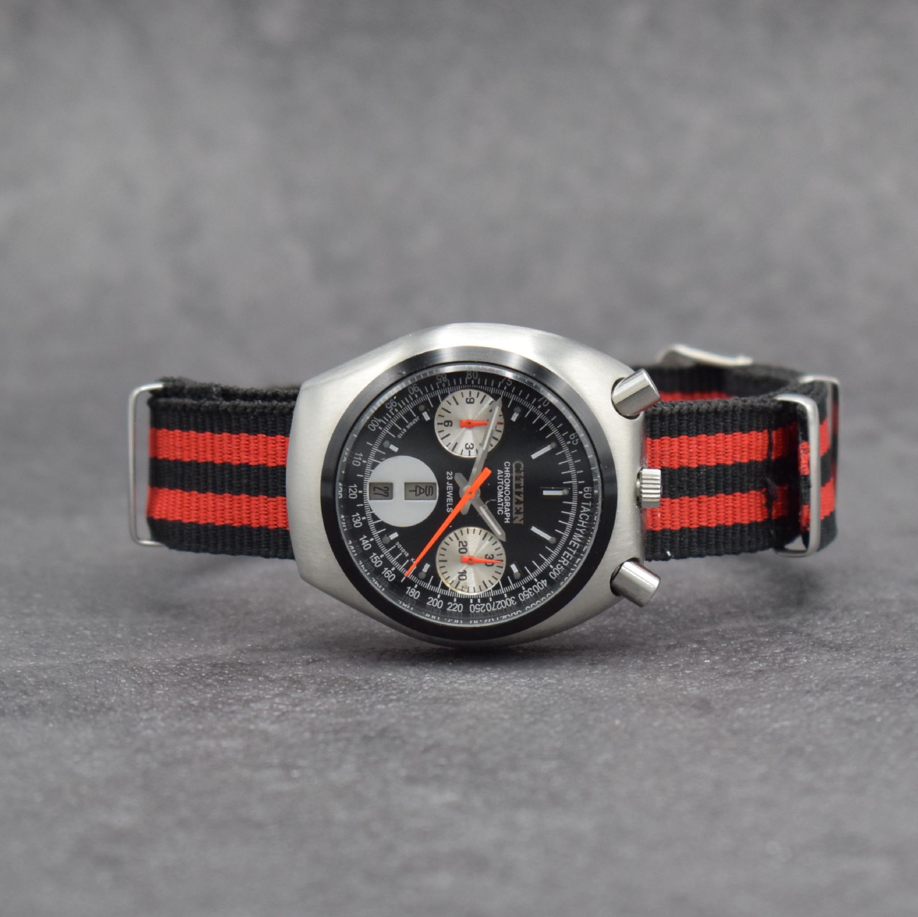 CITIZEN sog. Bullhead Herrenarmbanduhr mit Flyback-Chronograph, Japan um 1970, Automatik, Ref. 4-901177 Y, verchr. Geh., Boden geschr., schwarzes ...