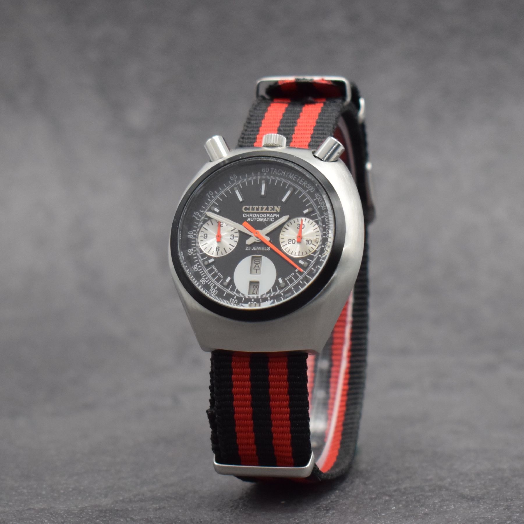 Detail b: CITIZEN sog. Bullhead Herrenarmbanduhr mit Flyback-Chronograph, Japan um 1970, Automatik, Ref. 4-901177 Y, verchr. Geh., Boden geschr., schwarzes ...