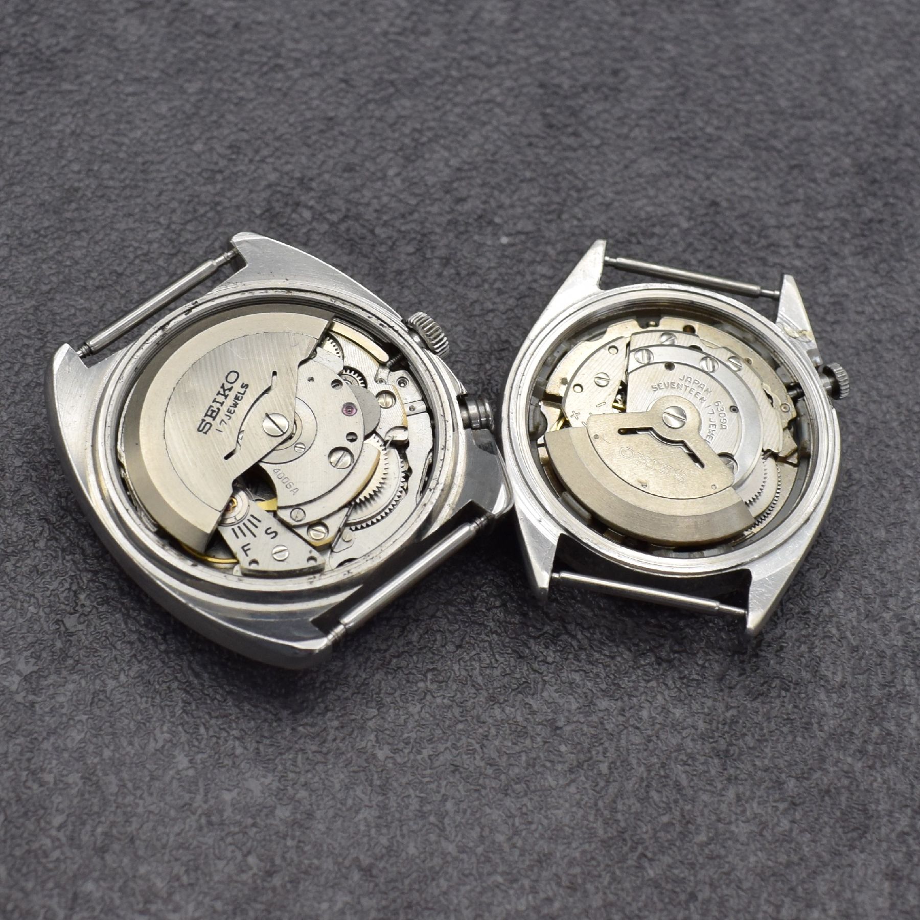Detail g: Konvolut: 4 Seiko Armbanduhren in Stahl, Japan 1970/80er Jahre, alle Automatik, 3 x Böden verschr., 1 x Stülpgeh., 1 x mit Wecker Modell BELL-MATIC ...