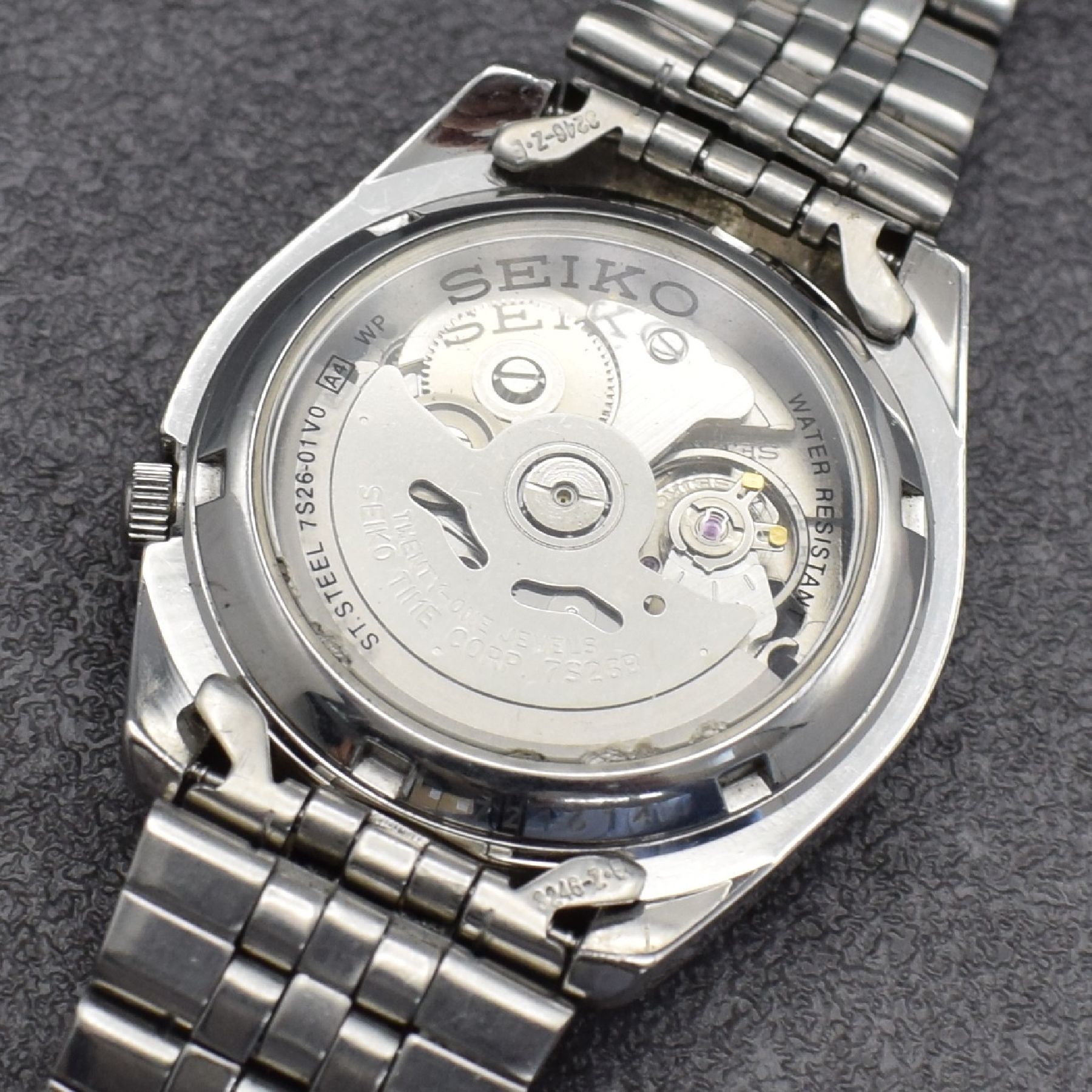 Detail h: Konvolut: 4 Seiko Armbanduhren in Stahl, Japan 1970/80er Jahre, alle Automatik, 3 x Böden verschr., 1 x Stülpgeh., 1 x mit Wecker Modell BELL-MATIC ...
