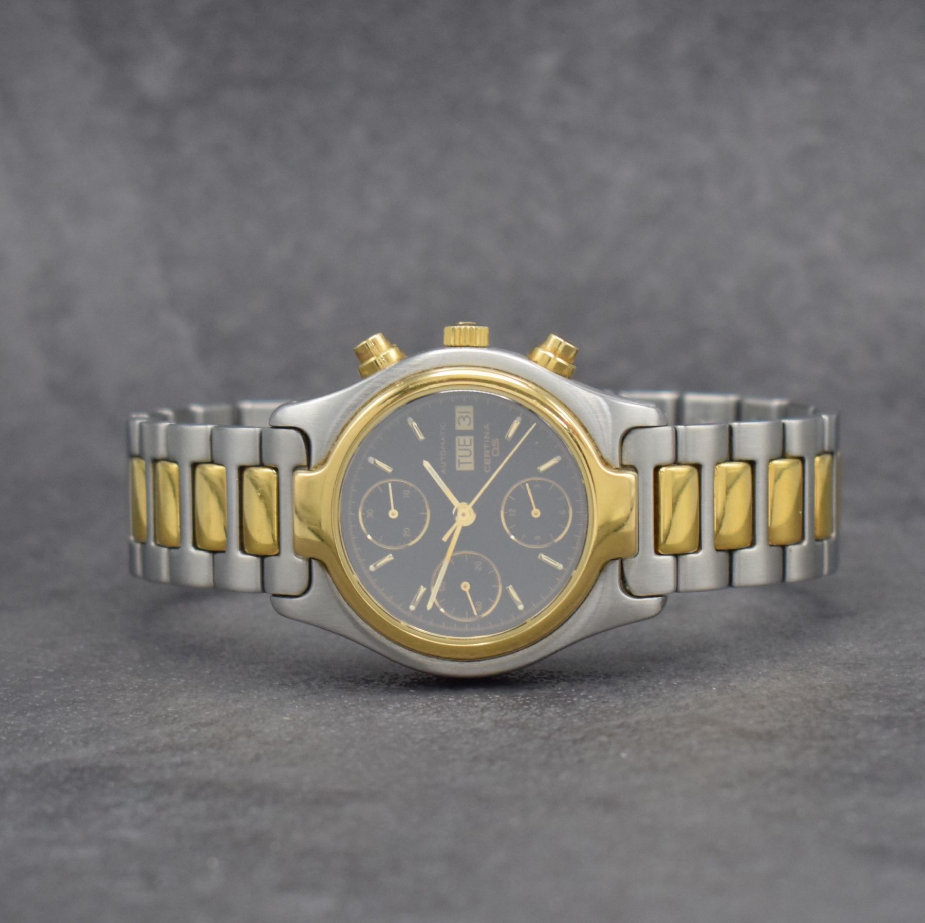 CERTINA DS Herrenarmbanduhr mit Chronograph, Schweiz um 1990, Automatik, z. T. verg. Stahlgeh. inkl. Gliederband m. Faltschl., schwarzes Zifferbl. m. ...