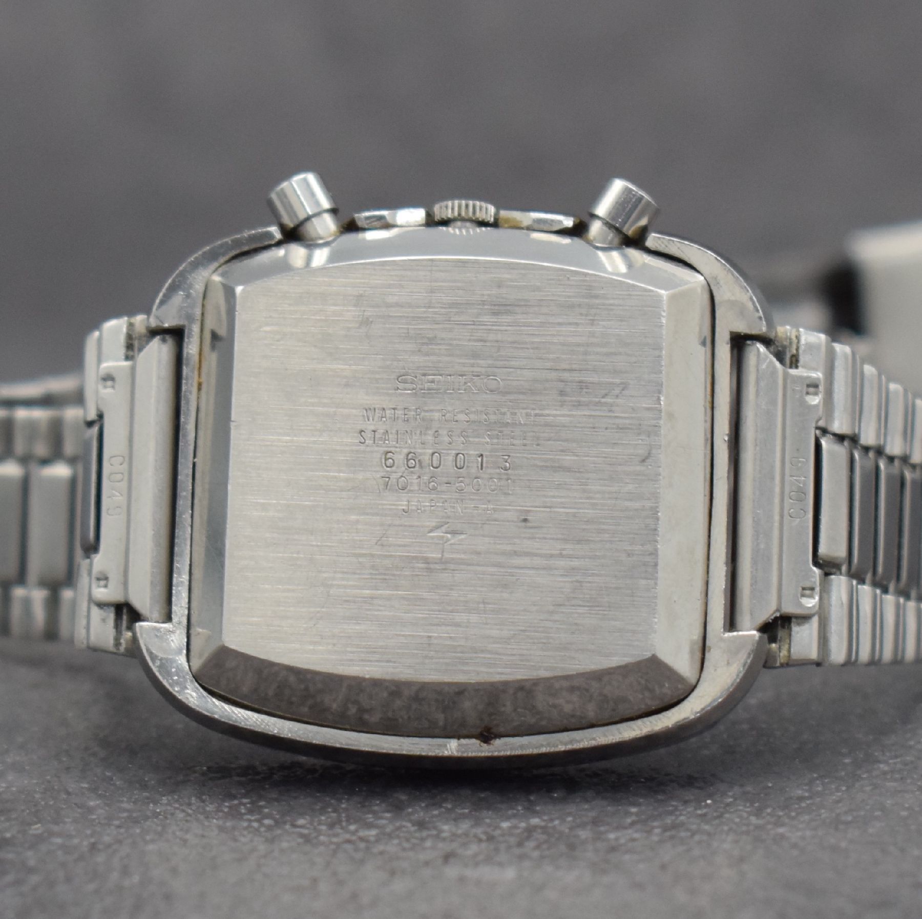 Detail e: SEIKO seltener Flyback-Chronograph mit Stunden- & Minutenzähler bei 6, Japan um 1975, Automatik, Stahl-Stülpgeh. Ref. 7016- 5001, Seiko Gliederband ...