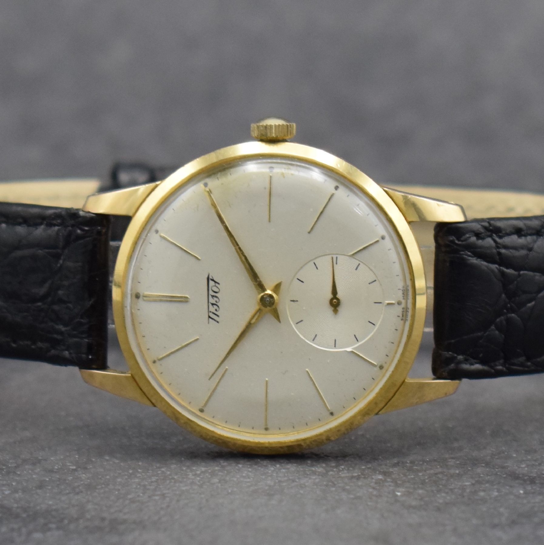 Detail d: TISSOT 3 Herrenarmbanduhren, Schweiz um 1950 - 1970, 1) T12 Automatik m. Datum, Geh. in Stahl & teils verg., Kal. 784-2 M. ca. 41 x 34 mm, 2) Kal. 27 ...