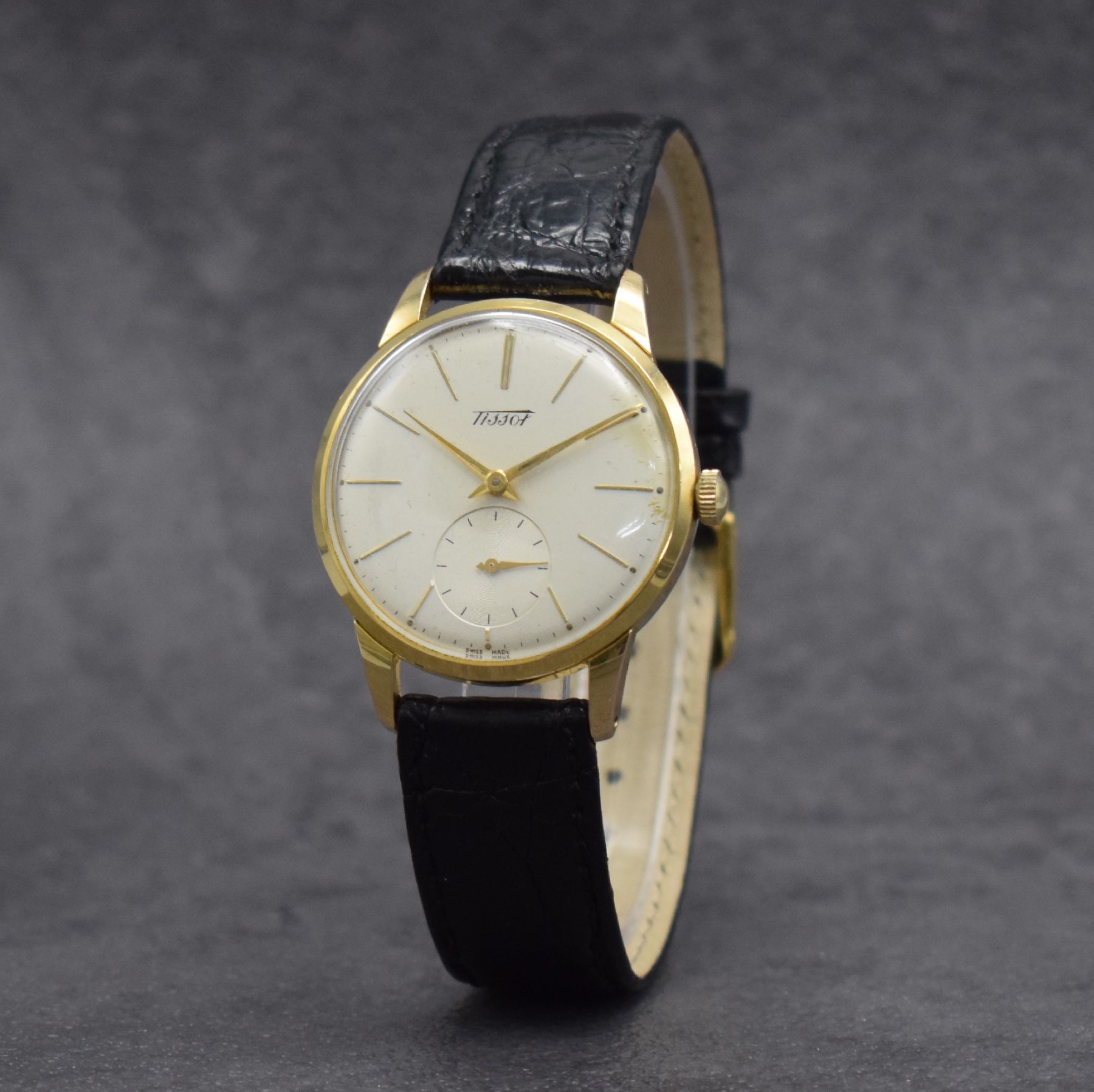Detail e: TISSOT 3 Herrenarmbanduhren, Schweiz um 1950 - 1970, 1) T12 Automatik m. Datum, Geh. in Stahl & teils verg., Kal. 784-2 M. ca. 41 x 34 mm, 2) Kal. 27 ...