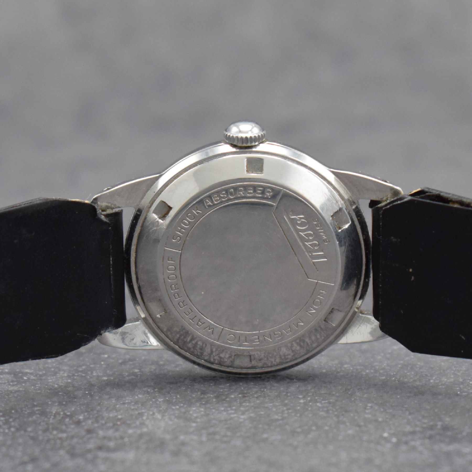 Detail i: TISSOT 3 Herrenarmbanduhren, Schweiz um 1950 - 1970, 1) T12 Automatik m. Datum, Geh. in Stahl & teils verg., Kal. 784-2 M. ca. 41 x 34 mm, 2) Kal. 27 ...