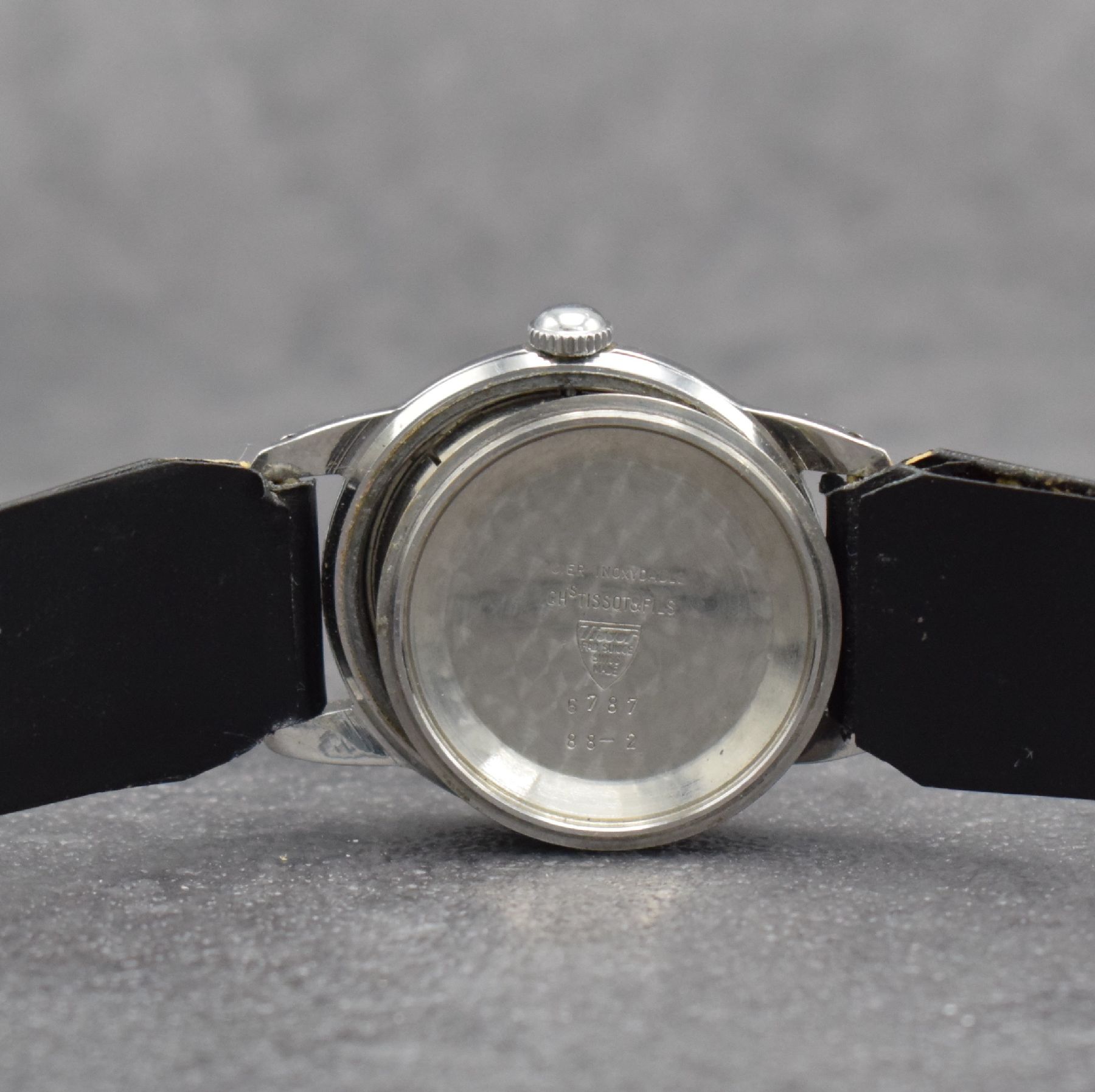 Detail k: TISSOT 3 Herrenarmbanduhren, Schweiz um 1950 - 1970, 1) T12 Automatik m. Datum, Geh. in Stahl & teils verg., Kal. 784-2 M. ca. 41 x 34 mm, 2) Kal. 27 ...