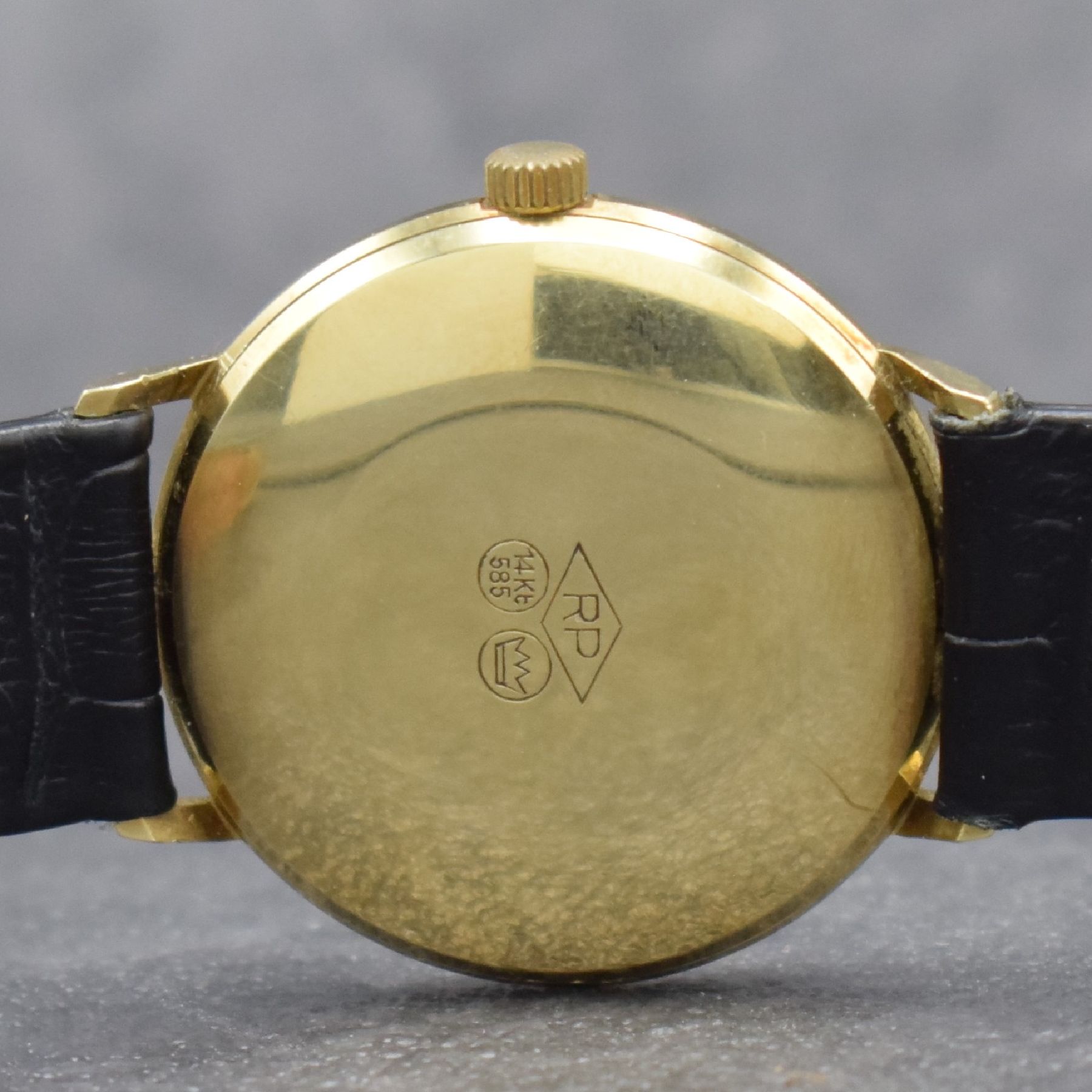 Detail b: 2 Herrenarmbanduhren in GG 585/000, Deutschland um 1950-1960, 1) DUCADO, Automatik, Boden aufgedr., silb. Zifferbl., Datum, Kal. PUW 1261, 25 St., D. ...