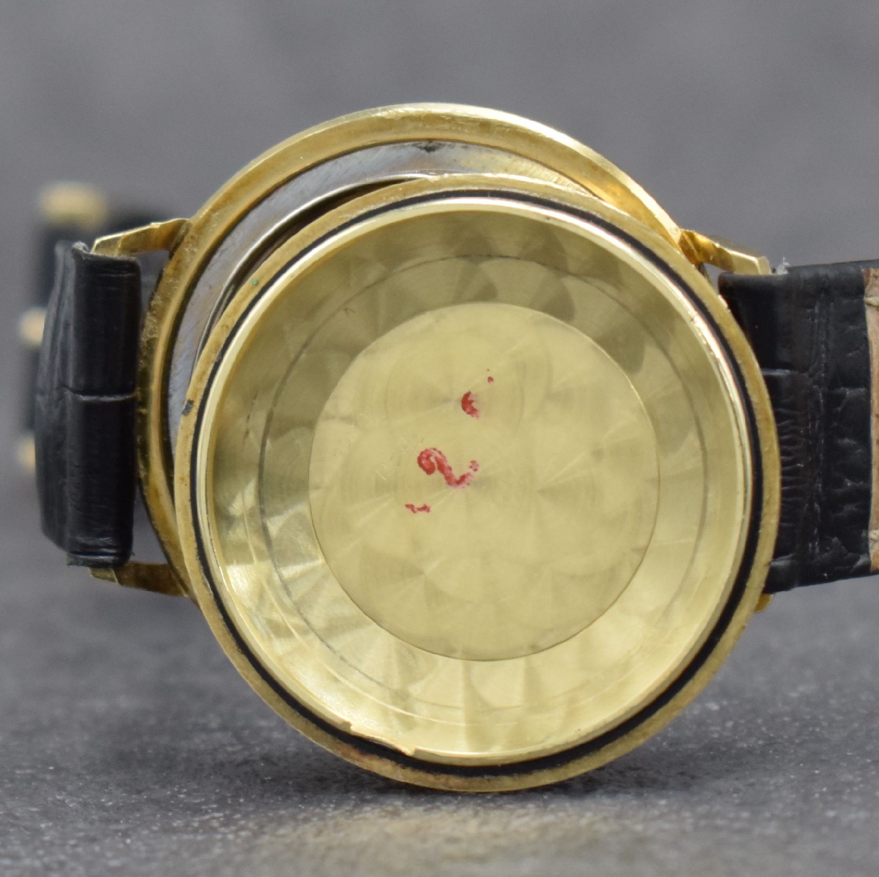 Detail d: 2 Herrenarmbanduhren in GG 585/000, Deutschland um 1950-1960, 1) DUCADO, Automatik, Boden aufgedr., silb. Zifferbl., Datum, Kal. PUW 1261, 25 St., D. ...