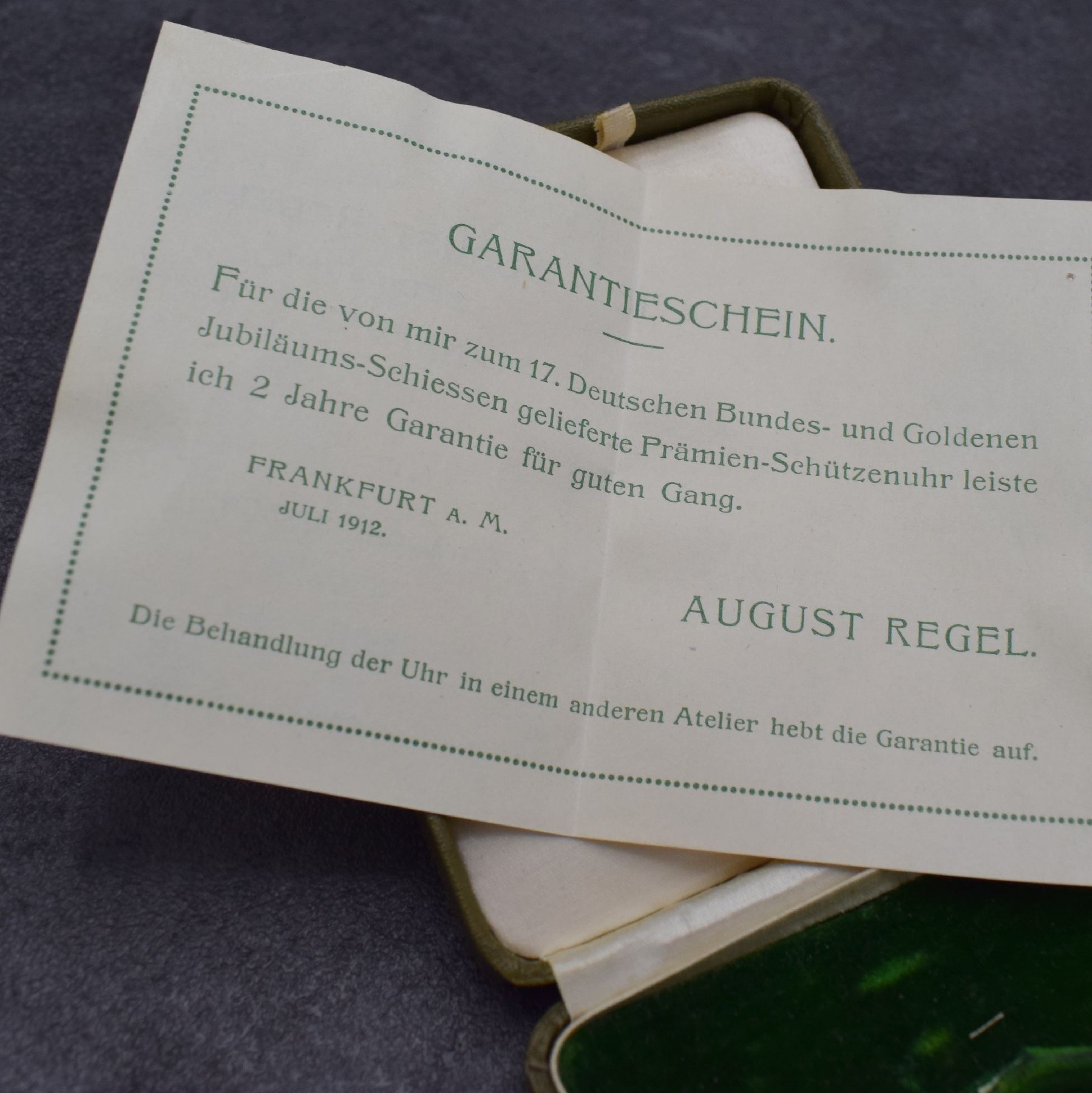 Detail n: IWC / Uhrenfabrik von J. Rauschenbach offene Schützenuhr in Silber mit original Etui & Garantieschein, Schweiz um 1912, beids. geprägtes Geh., auf ...