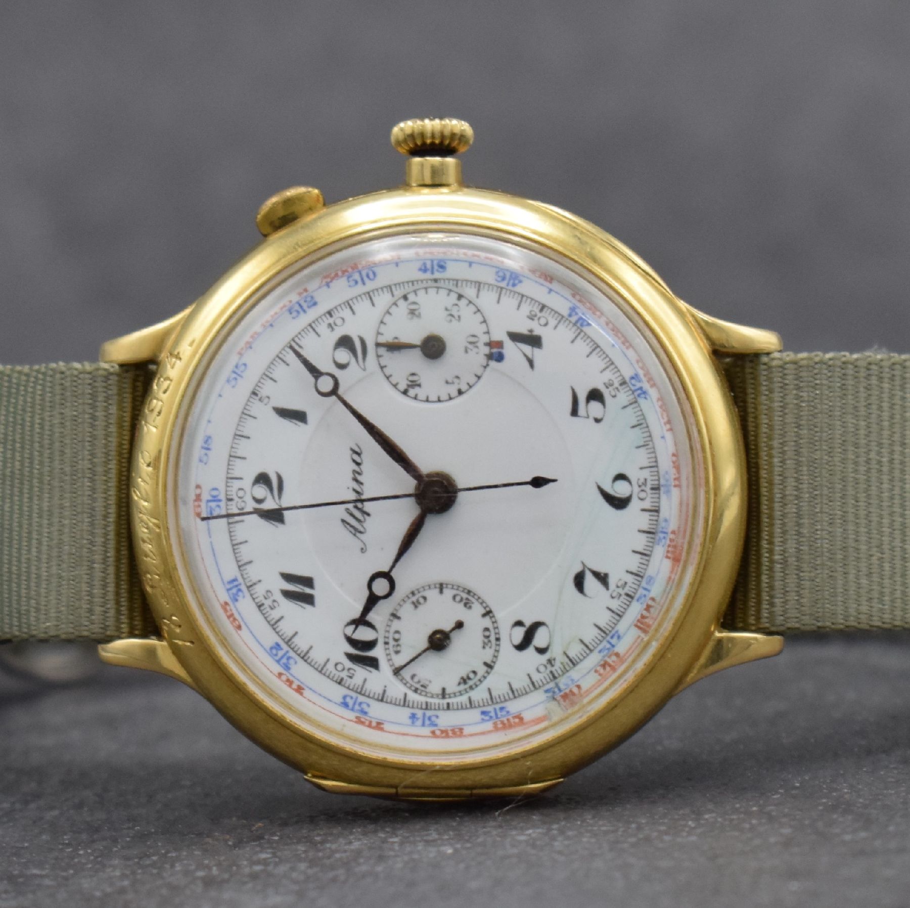 Detail a: ALPINA / Minerva Kal. 16-29 großer Schaltradchronograph in GG 750/000, Schweiz um 1934, Handaufzug, Scharniergeh., Lünette m. Widmungsgravur, ...