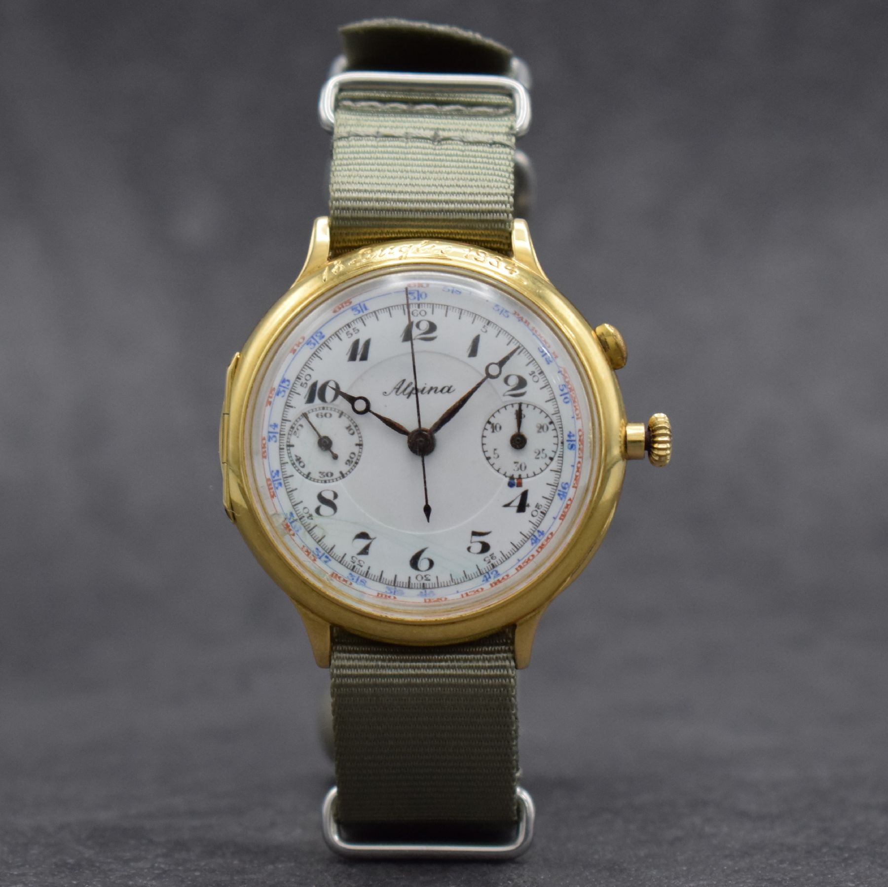 Detail b: ALPINA / Minerva Kal. 16-29 großer Schaltradchronograph in GG 750/000, Schweiz um 1934, Handaufzug, Scharniergeh., Lünette m. Widmungsgravur, ...