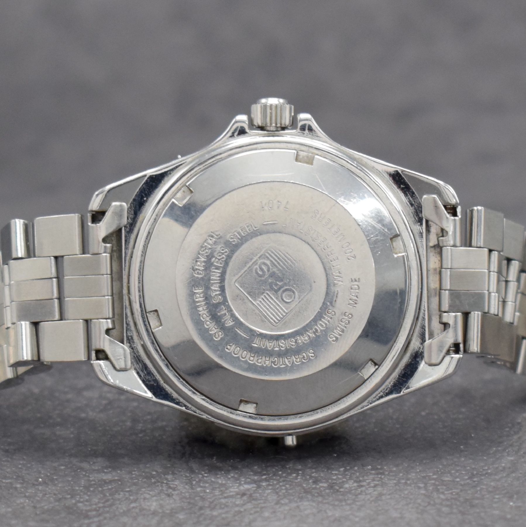 Detail d: 2 ORIS Armbanduhren mit Datum, Schweiz um 1990, 1) Automatik in Edelstahl, verschr. Geh., Gliederband m. Faltschl., drehb. Lünette, schwarzes ...