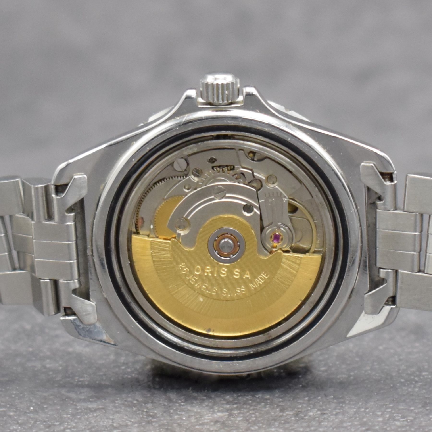 Detail e: 2 ORIS Armbanduhren mit Datum, Schweiz um 1990, 1) Automatik in Edelstahl, verschr. Geh., Gliederband m. Faltschl., drehb. Lünette, schwarzes ...