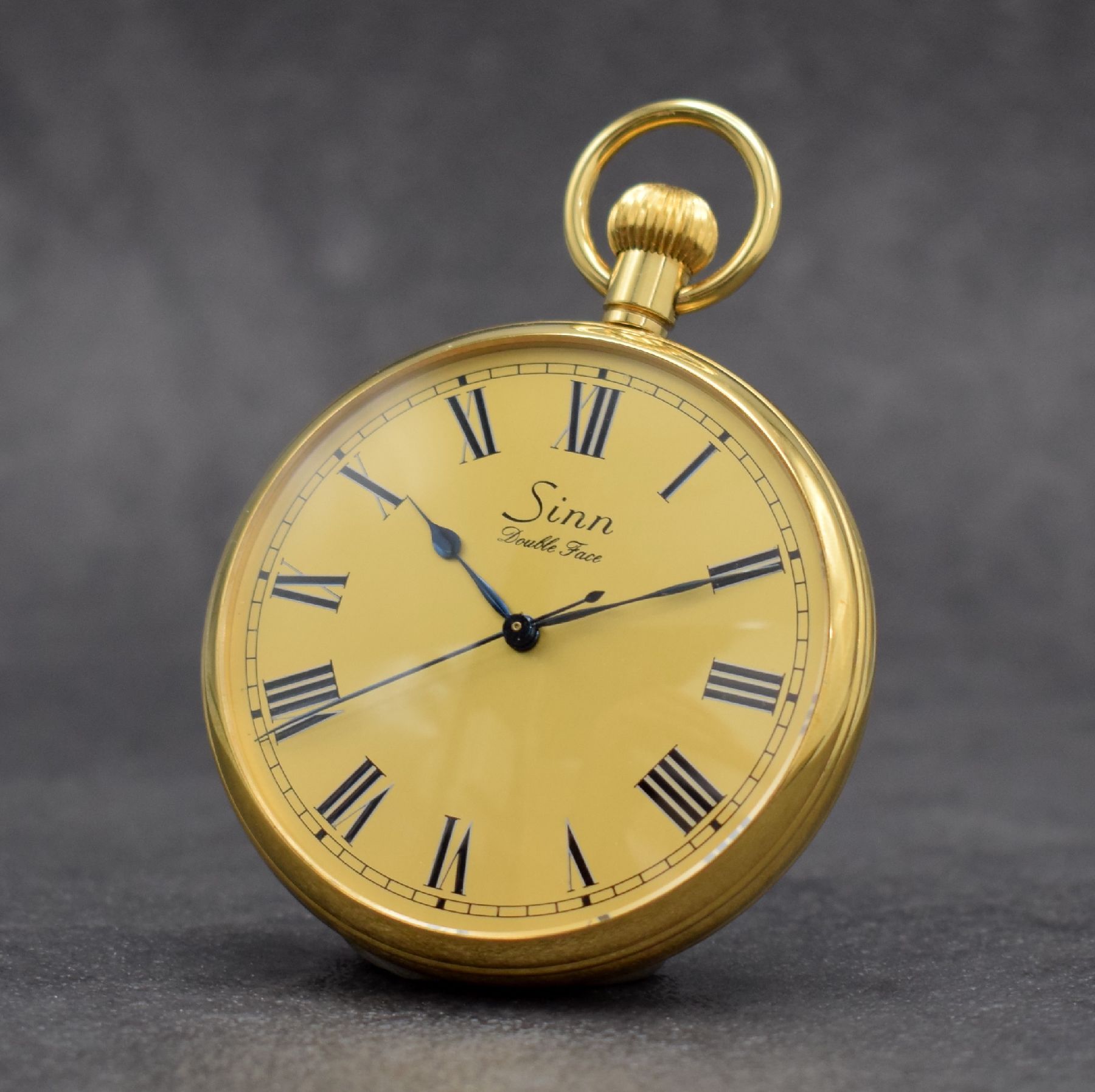 SINN seltene B-Uhr Double Face, Deutschland 1990er Jahre, verg. Metallgeh. beids. vergl., gold. Zifferbl. m. röm. Std., gebl. Zeiger, Anz. v. Std., ...