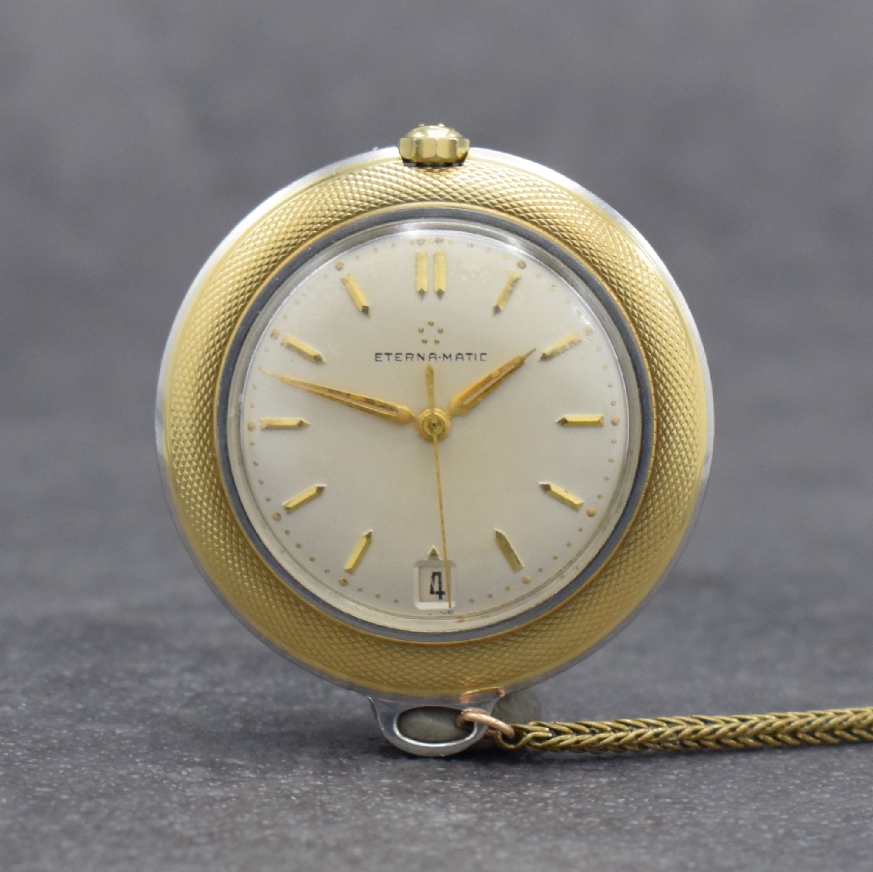 ETERNA-MATIC Golfer Taschenuhr in Edelstahl & Gold, Schweiz um 1960, Automatik, beids. vergl. Geh., Boden geschr., silb. Zifferbl. m. aufges. ...