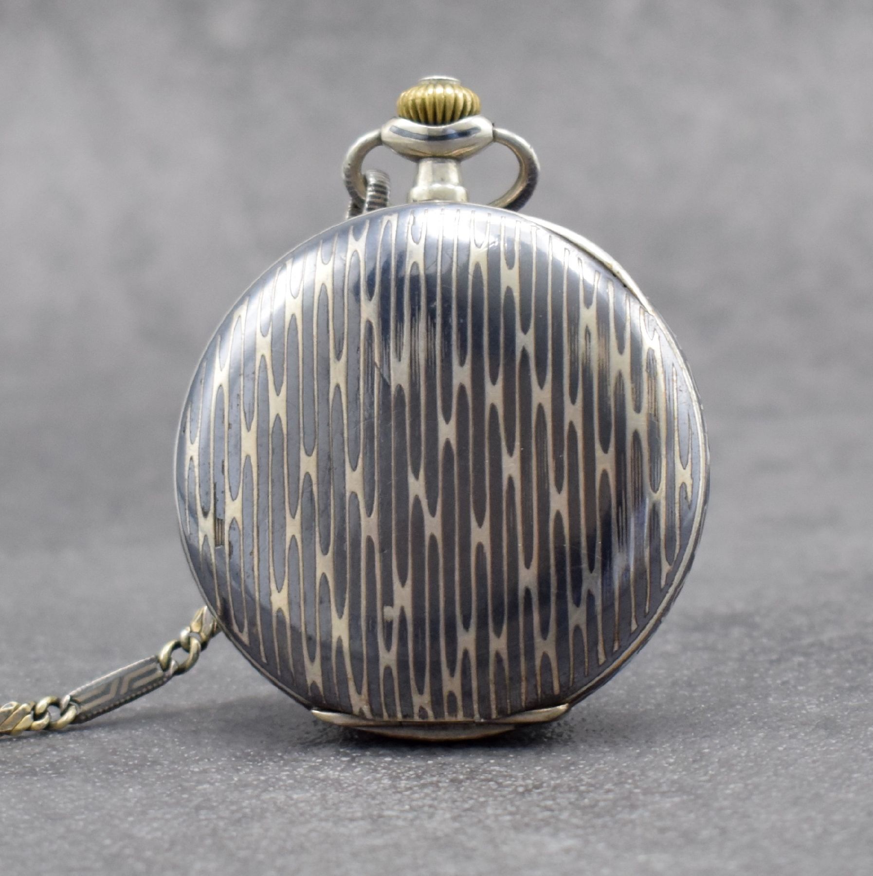 Detail c: NOMOS Uhr-Gesellschaft Guido Müller & Co Glashütte I/S Savonette in Tula-Silber, Deutschland um 1905, aufw. verz. Gehäuse l. besch., 3-teil. ...