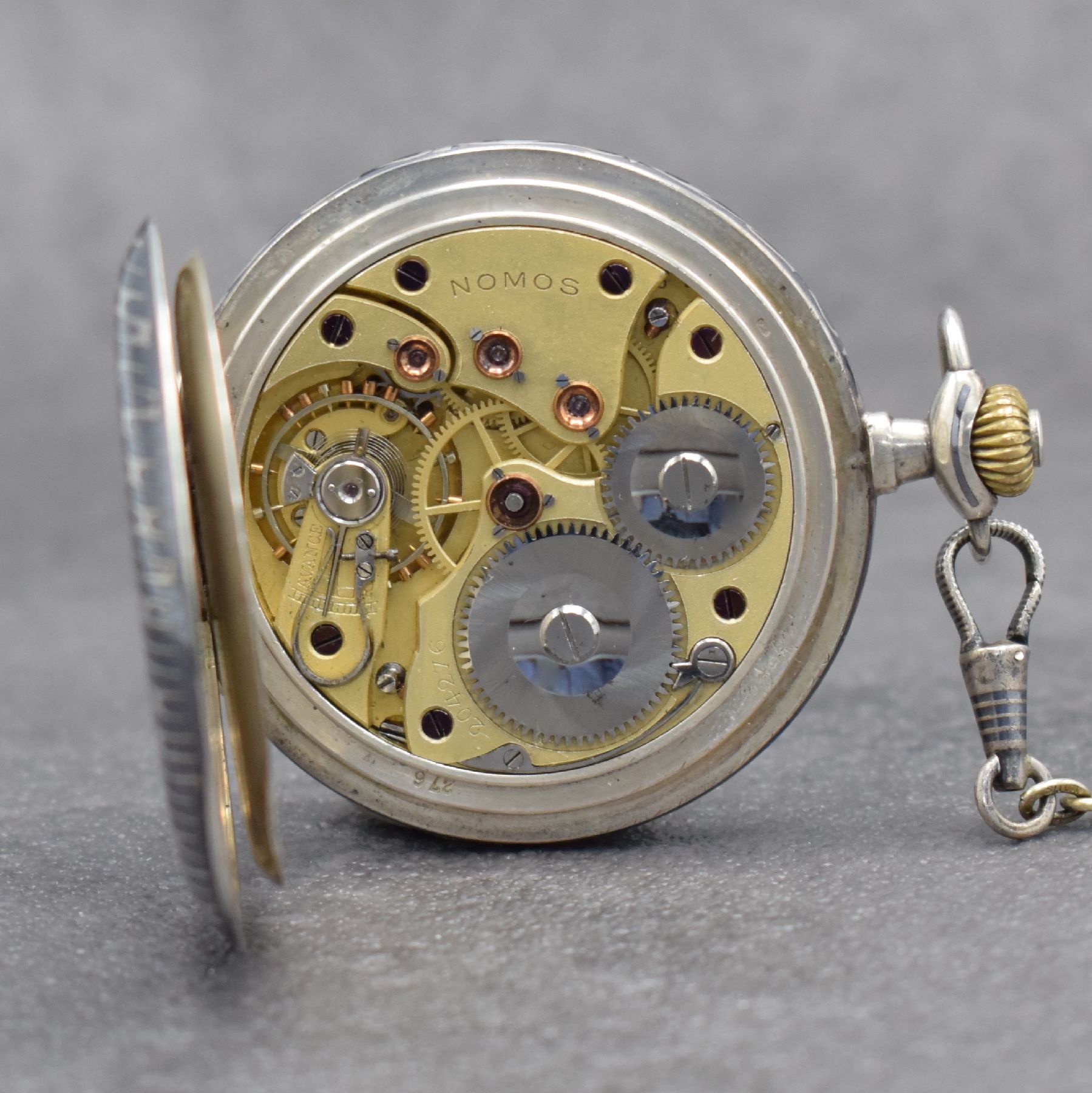 Detail e: NOMOS Uhr-Gesellschaft Guido Müller & Co Glashütte I/S Savonette in Tula-Silber, Deutschland um 1905, aufw. verz. Gehäuse l. besch., 3-teil. ...