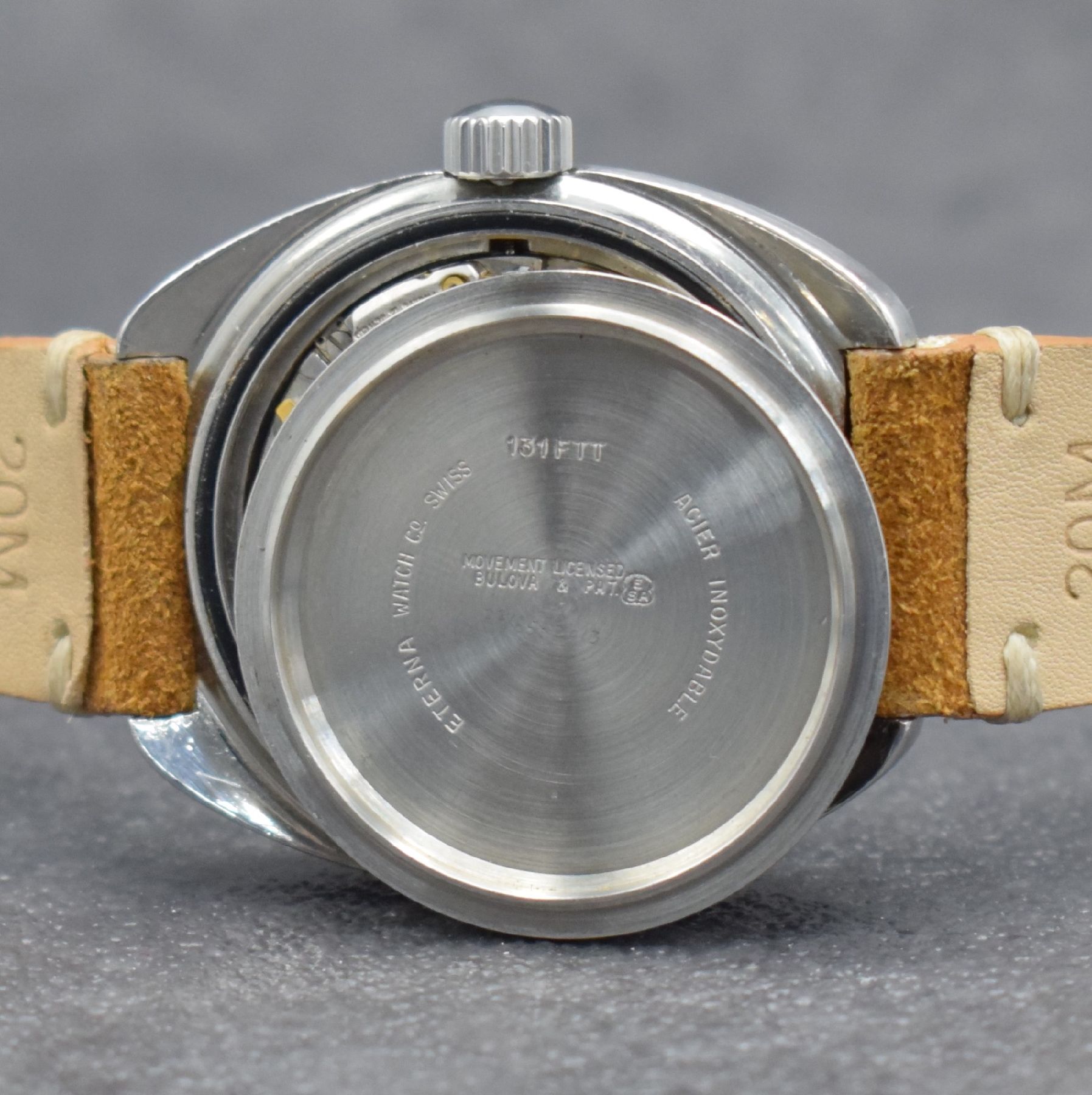 Detail g: ETERNA SONIC Kontiki SEVENDAY electronic Armbanduhr, Schweiz 1970er Jahre, Ref. 131FTT, massives Edelstahlgeh., Boden m. zentraler Goldplakette & ...