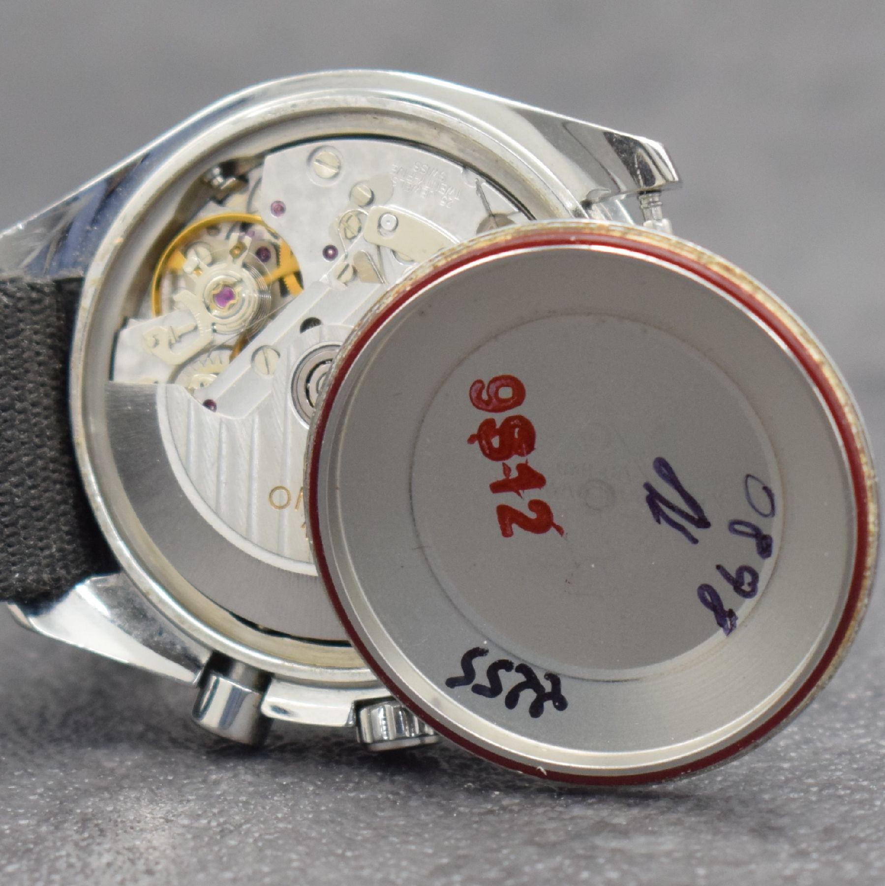 Detail f: OMEGA Armbandchronograph Serie Speedmaster, Automatik, Schweiz um 2005, Ref. 175.0084, Edelstahlgeh. inkl. neutr. Ripsband, Boden aufgedr., Lün. m. ...