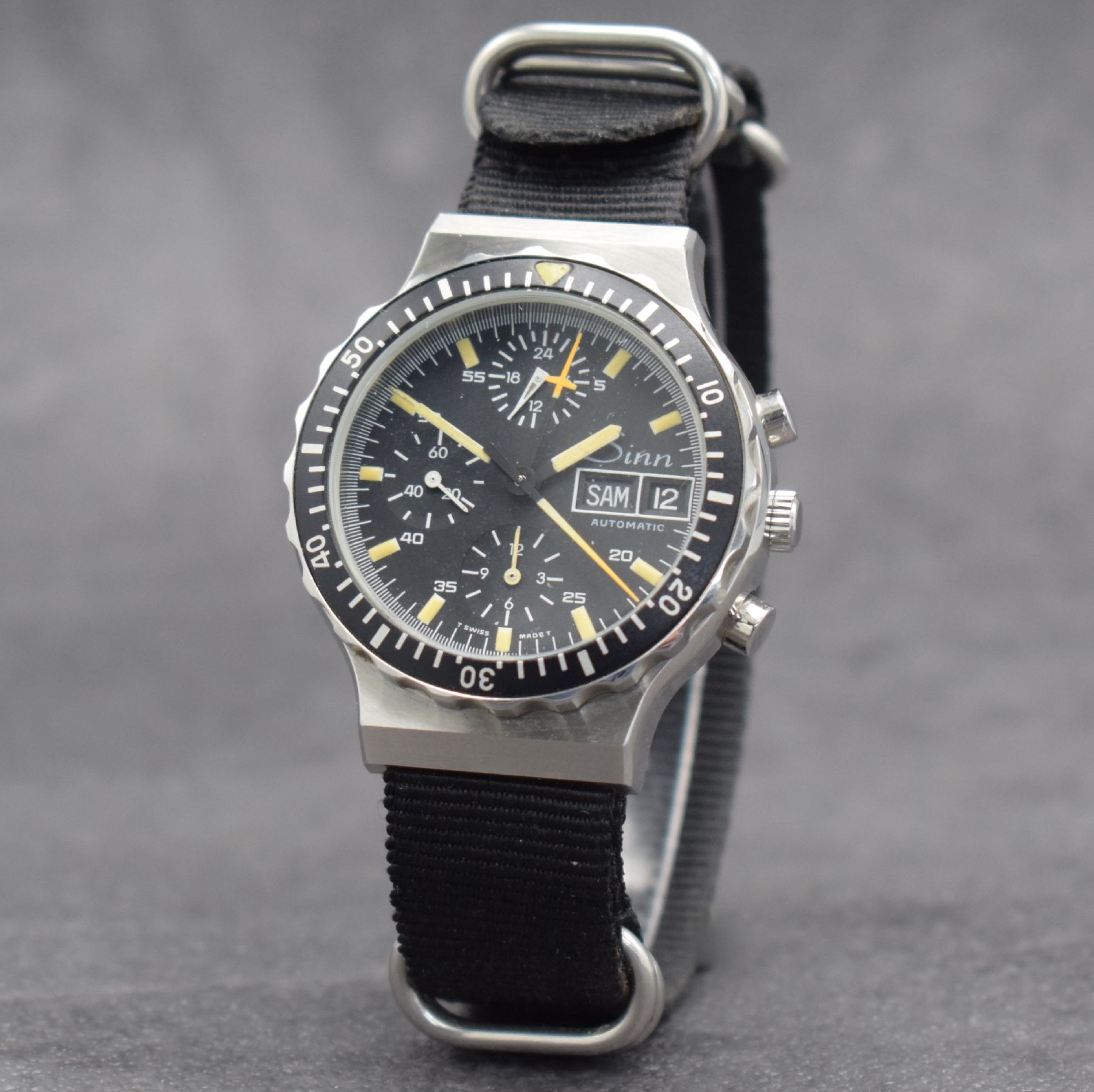 Detail b: SINN seltener Armbandchronograph in Stahl Referenz 11019, Automatik, Schweiz/Deutschland um 1980, Boden aufgedr., neutr. Ripsband, Lün. m. 60er ...