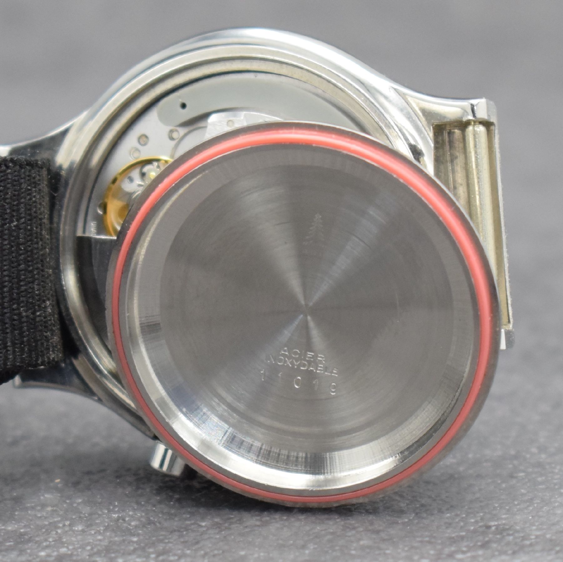Detail g: SINN seltener Armbandchronograph in Stahl Referenz 11019, Automatik, Schweiz/Deutschland um 1980, Boden aufgedr., neutr. Ripsband, Lün. m. 60er ...
