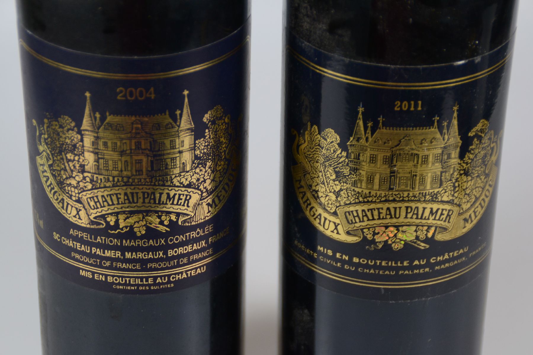 Detail a: 2 Fl. 2004 und 2011 Chateau Palmer, Margaux Medoc, 75 cl, top shoulder, nicht verkostet