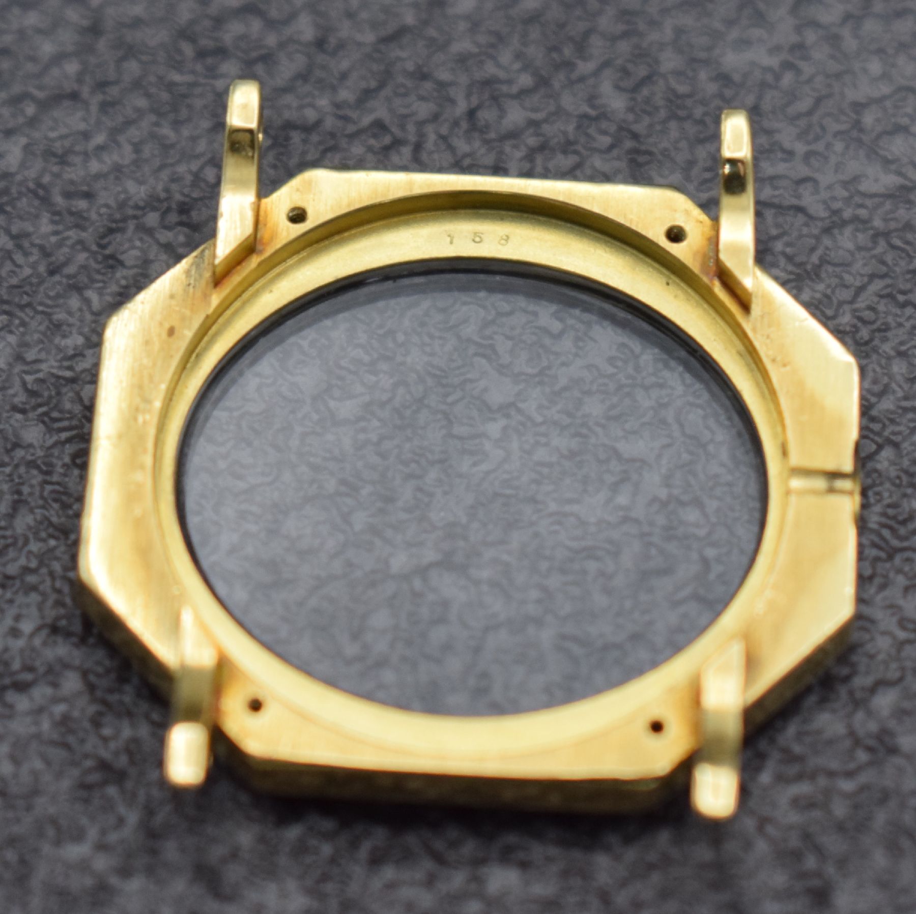 Detail l: PIAGET Designer Damenarmbanduhr in GG 750/000 Referenz 93431, Handaufzug, Schweiz um 1976, Boden 4-fach verschr., Lün. mit Koralle intarsiert, ...