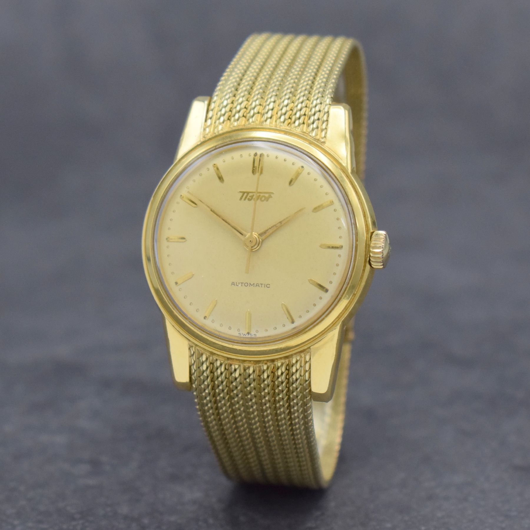 Detail b: TISSOT Herrenarmbanduhr in GG 585/000 an original Milanaiseband, Automatik, Schweiz um 1960, verschr. Boden m. starken Rep.-Spuren, gold. Zifferbl. ...