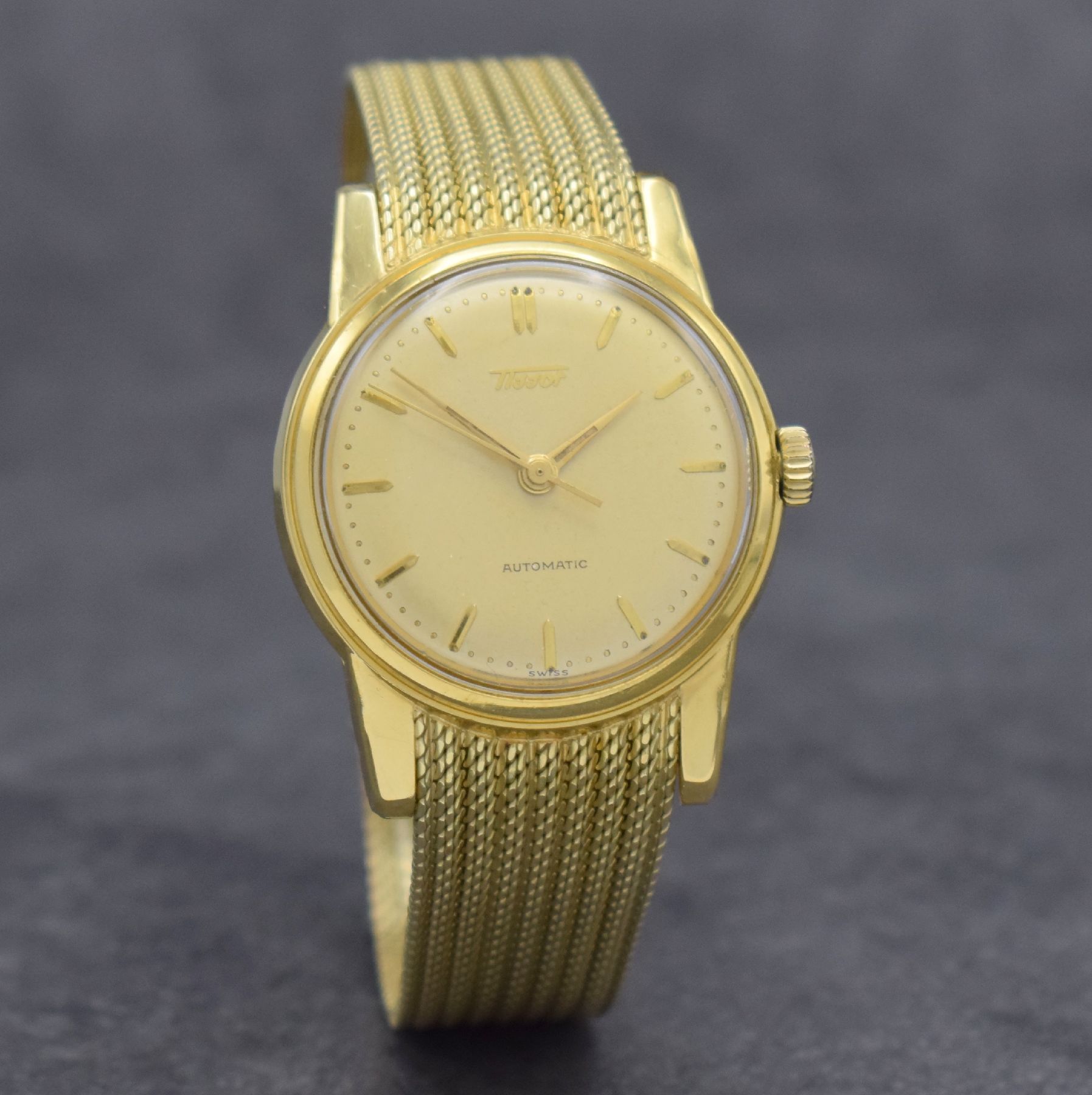Detail d: TISSOT Herrenarmbanduhr in GG 585/000 an original Milanaiseband, Automatik, Schweiz um 1960, verschr. Boden m. starken Rep.-Spuren, gold. Zifferbl. ...
