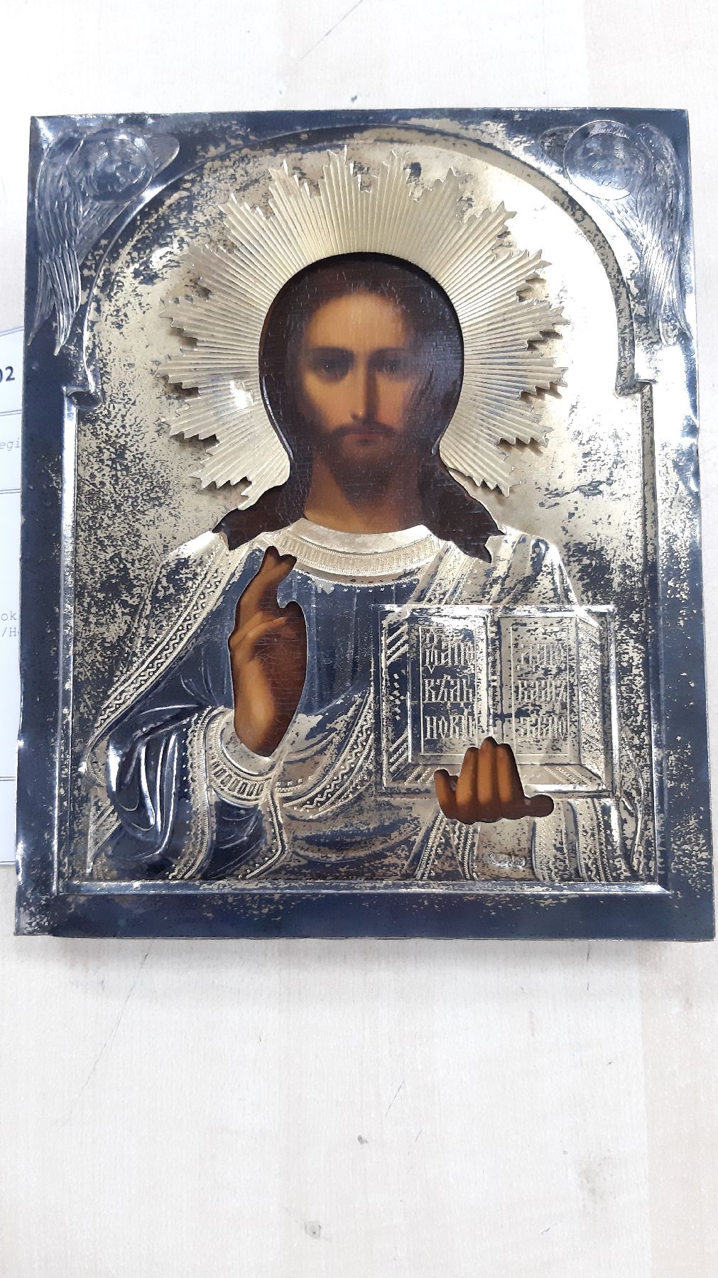 Detail b: Ikone Russland, um 1900, Silberoklad, Christus Pantokrator, Eitempera/Holz, 18 x 14 cm, Reste Vergoldung
