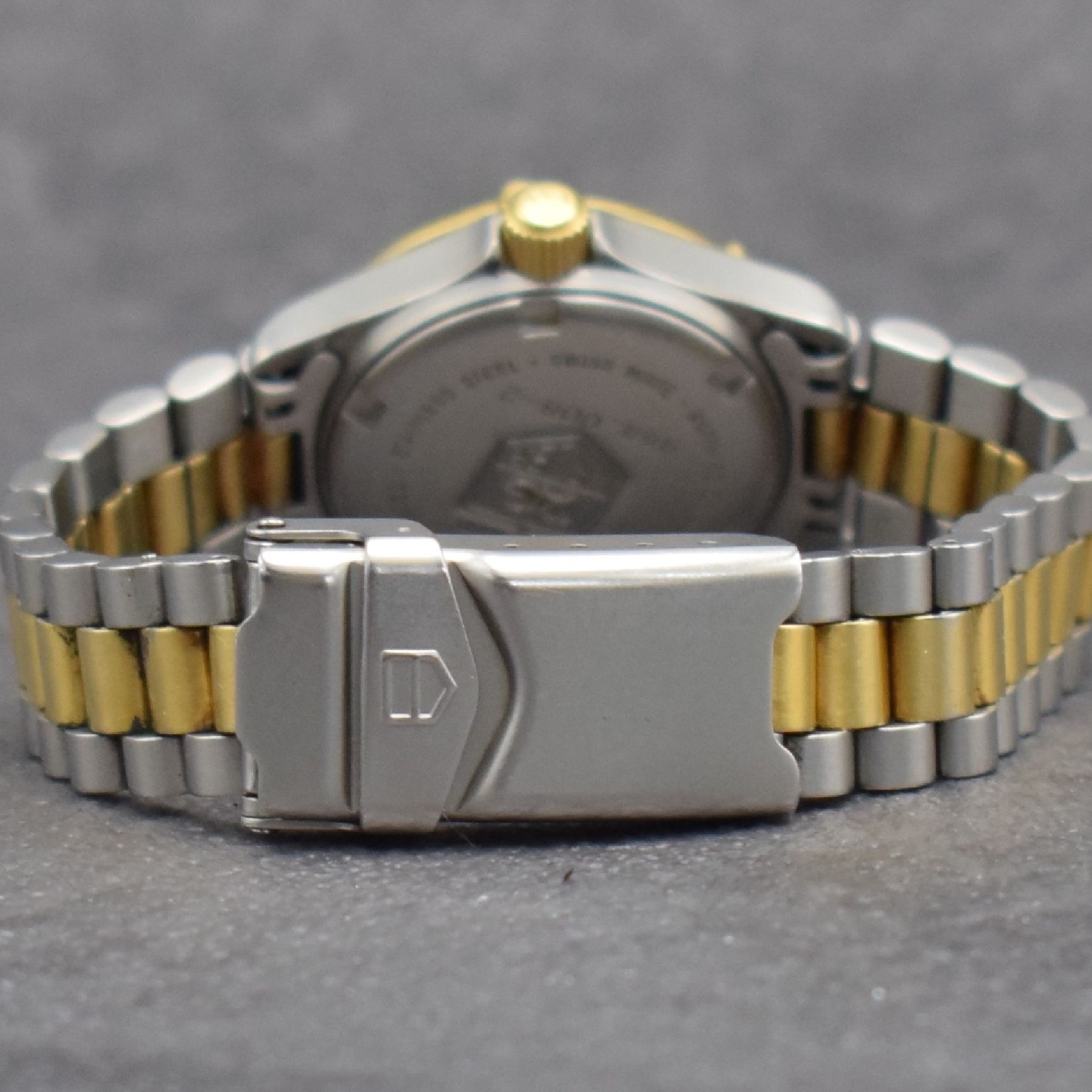 Detail d: TAG HEUER Professional Damensportuhr in Stahl/Gold, Schweiz um 1995, quarz, satin. Geh., Boden & Krone verschr., verg. eins. drehb. Lünette m. ...