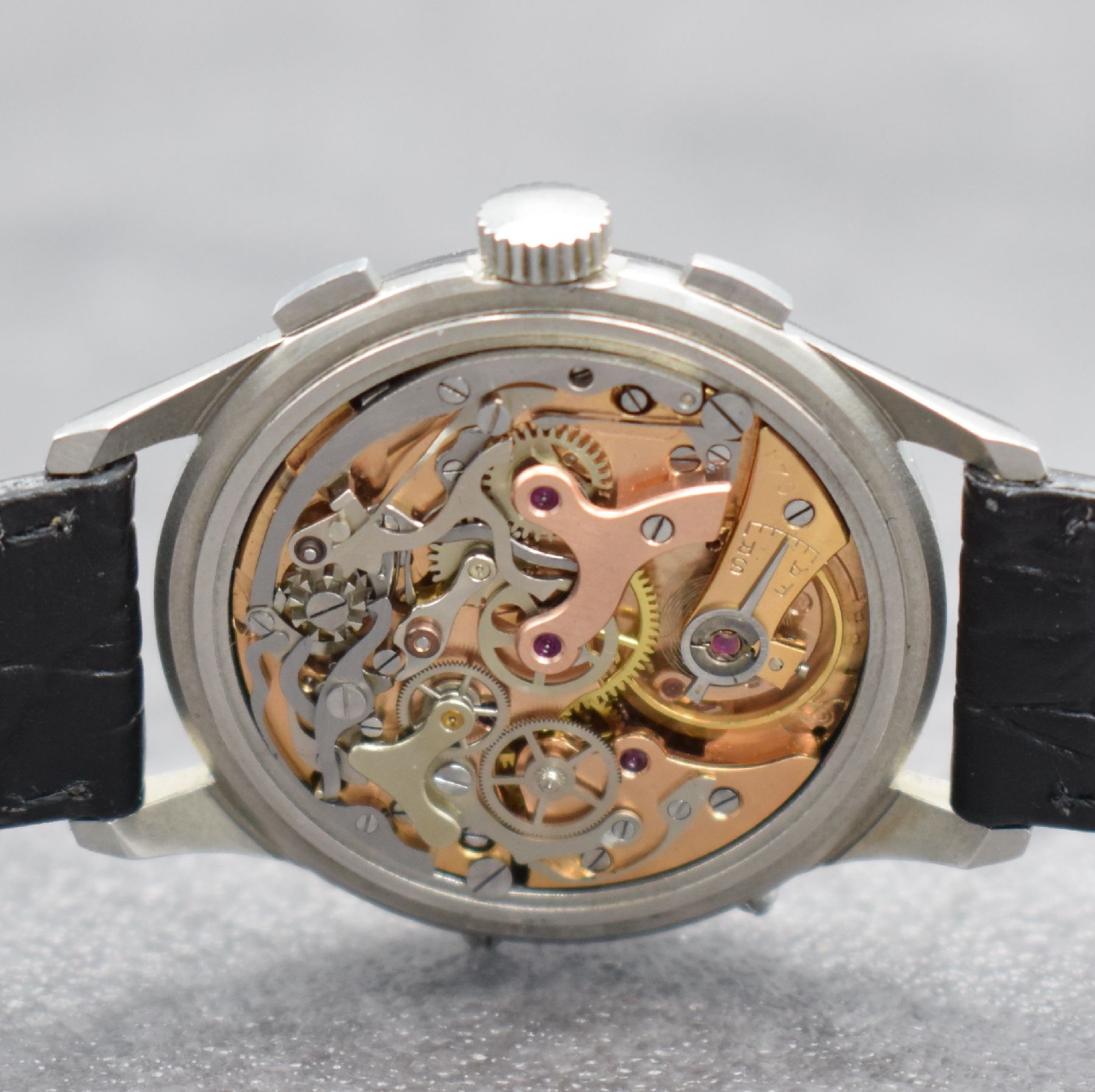Detail e: VALJOUX 88 nahezu neuwertiger Chronograph mit Vollkalender & Mondphase in Stahl, Schweiz um 1955, Handaufzug, 3-tlg. Geh., Boden & Glasrand aufgedr., ...