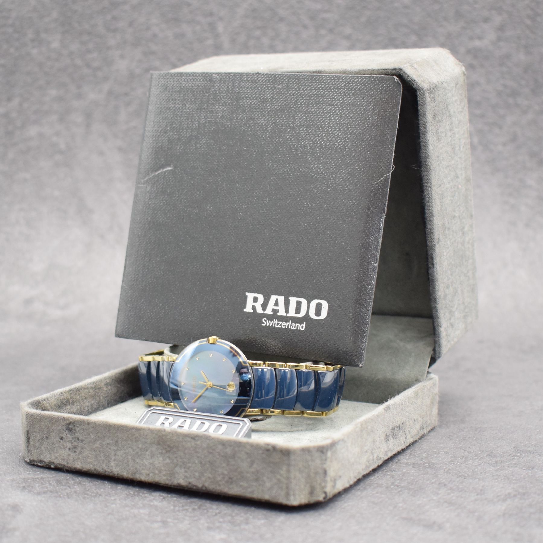 Detail e: RADO Diastar Damenarmbanduhr mit Keramikband, Schweiz lt. orig. Papier verk. 1997, quarz, gedr. Stahlgeh. m. gewölbtem Saphirglas, integr. ...