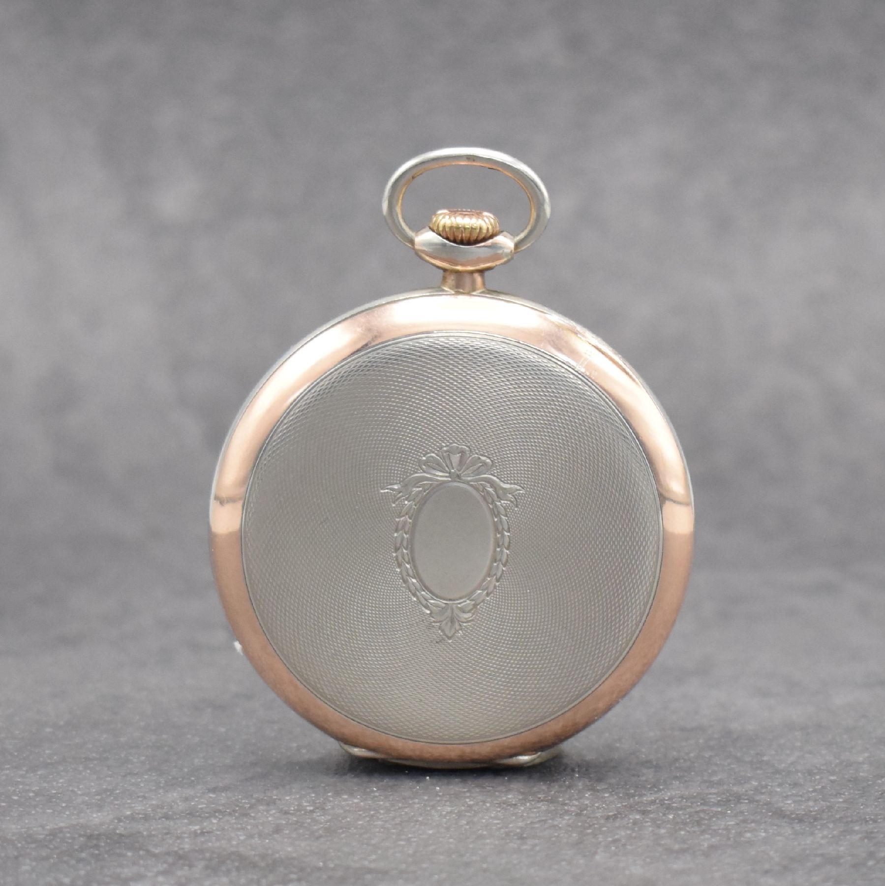 Detail a: IWC offene Taschenuhr in Silber Kal. 67, Schweiz um 1936, Rand verg., guill. Rückseite, Emailzifferbl. m. arab. Zahlen, gold. Zeiger, rhod. Werk ...