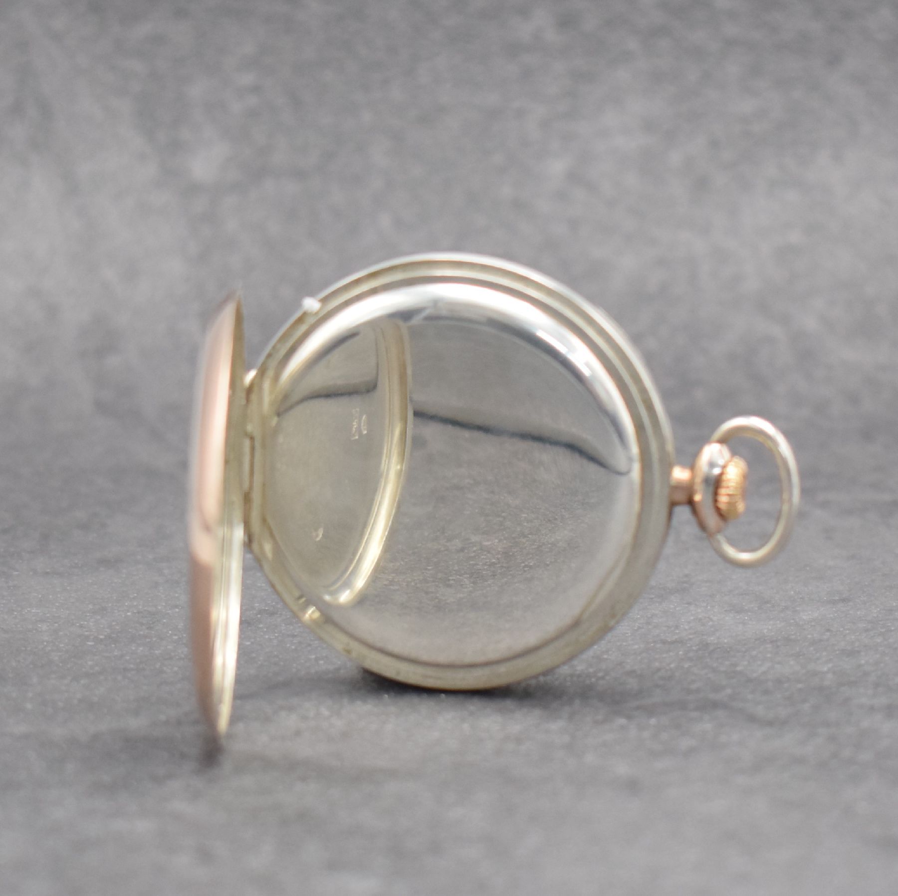 Detail c: IWC offene Taschenuhr in Silber Kal. 67, Schweiz um 1936, Rand verg., guill. Rückseite, Emailzifferbl. m. arab. Zahlen, gold. Zeiger, rhod. Werk ...