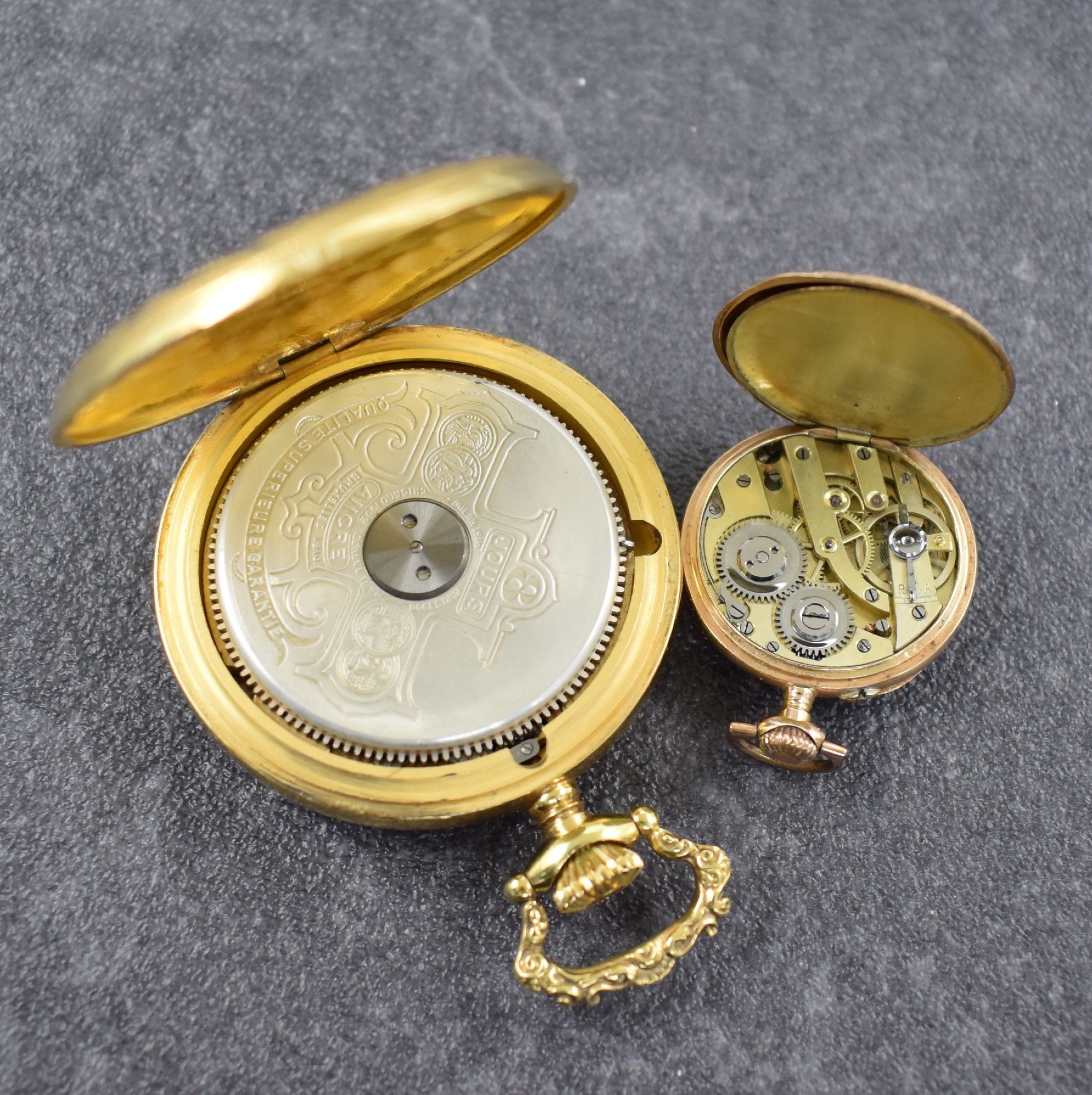 Detail c: Konvolut: 2 offene Taschenuhren, Schweiz um 1900/1950, 1)Hebdomas / Moeris m. 8 Tages- Werk, verg. Geh., Rücks. floral grav., weißes Emailzifferbl. ...