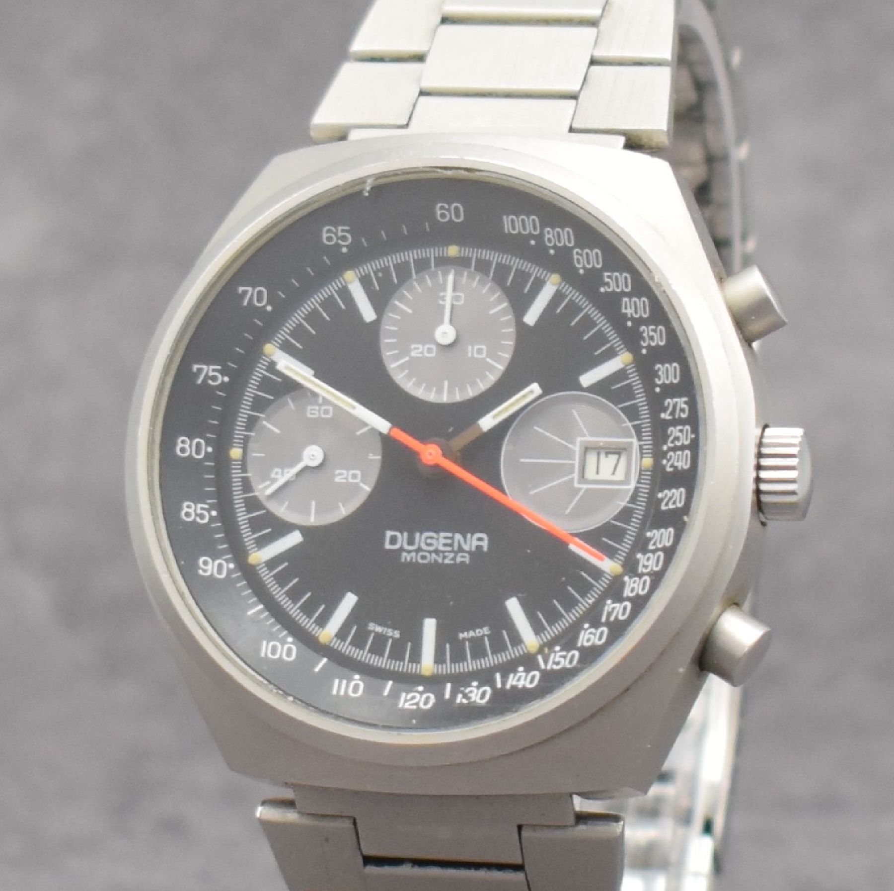 Detail c: DUGENA Armbandchronograph Serie Monza, Handaufzug, Schweiz um 1970, matt. Edelstahlgeh. inkl. Gliederband m. Faltschl., verschr. Boden m. ...