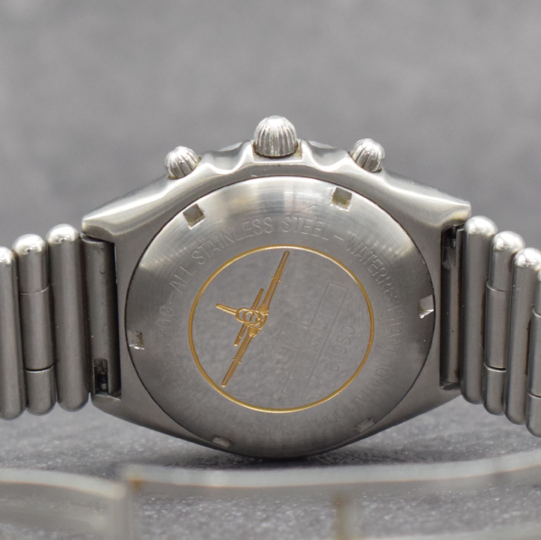 Detail e: BREITLING Chronomat Herrenarmbanduhr in Stahl mit Chronograph, Schweiz um 1990, Ref. 81950, Boden & Krone verschr., Roleauxband m. dopp. Faltschl., ...