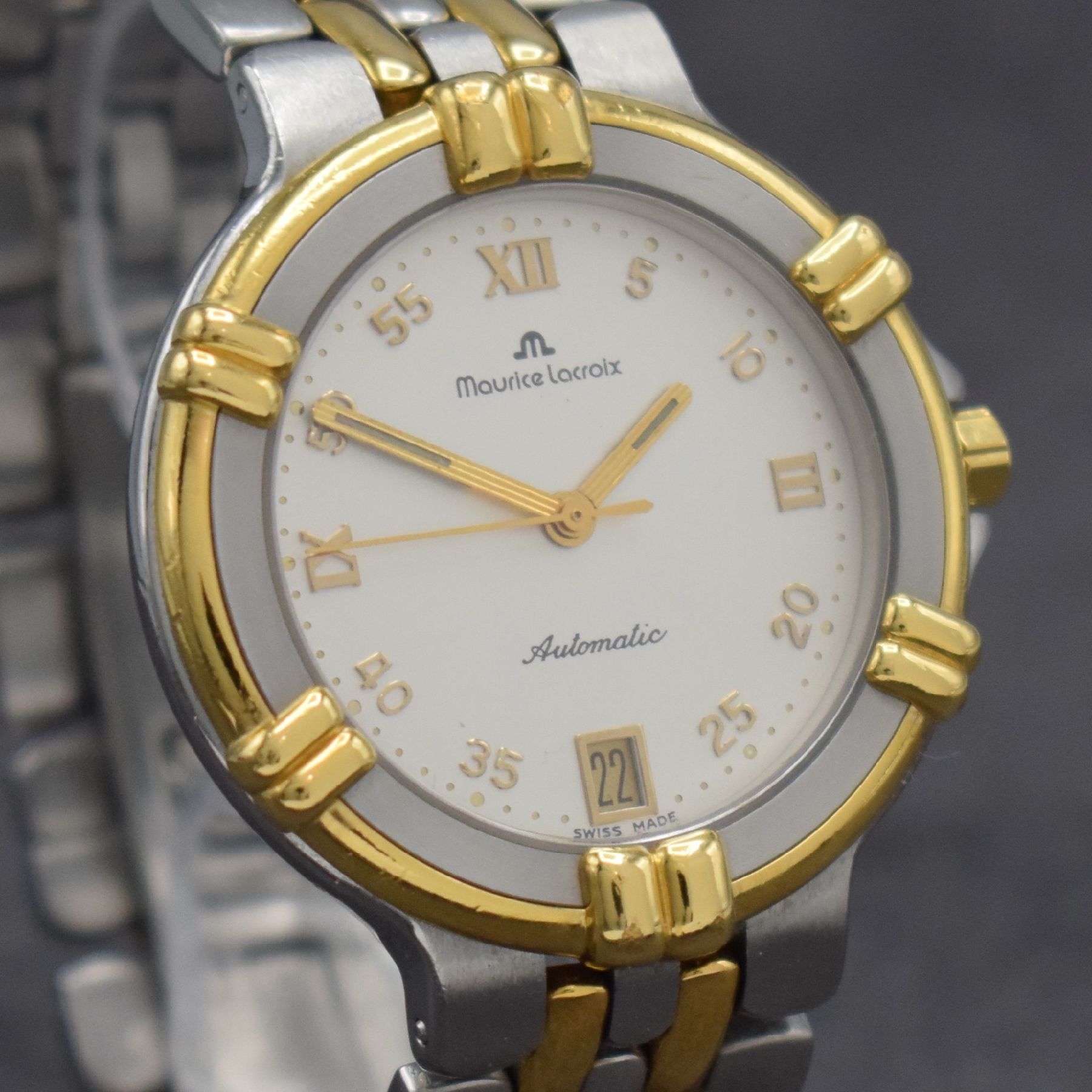 Detail e: MAURICE LACROIX Herrenarmbanduhr Modell Calypso, Schweiz um 2000, Automatik, beids. vergl. Stahlgeh. z. T. verg., Boden aufgedr., Krone verschr., ...