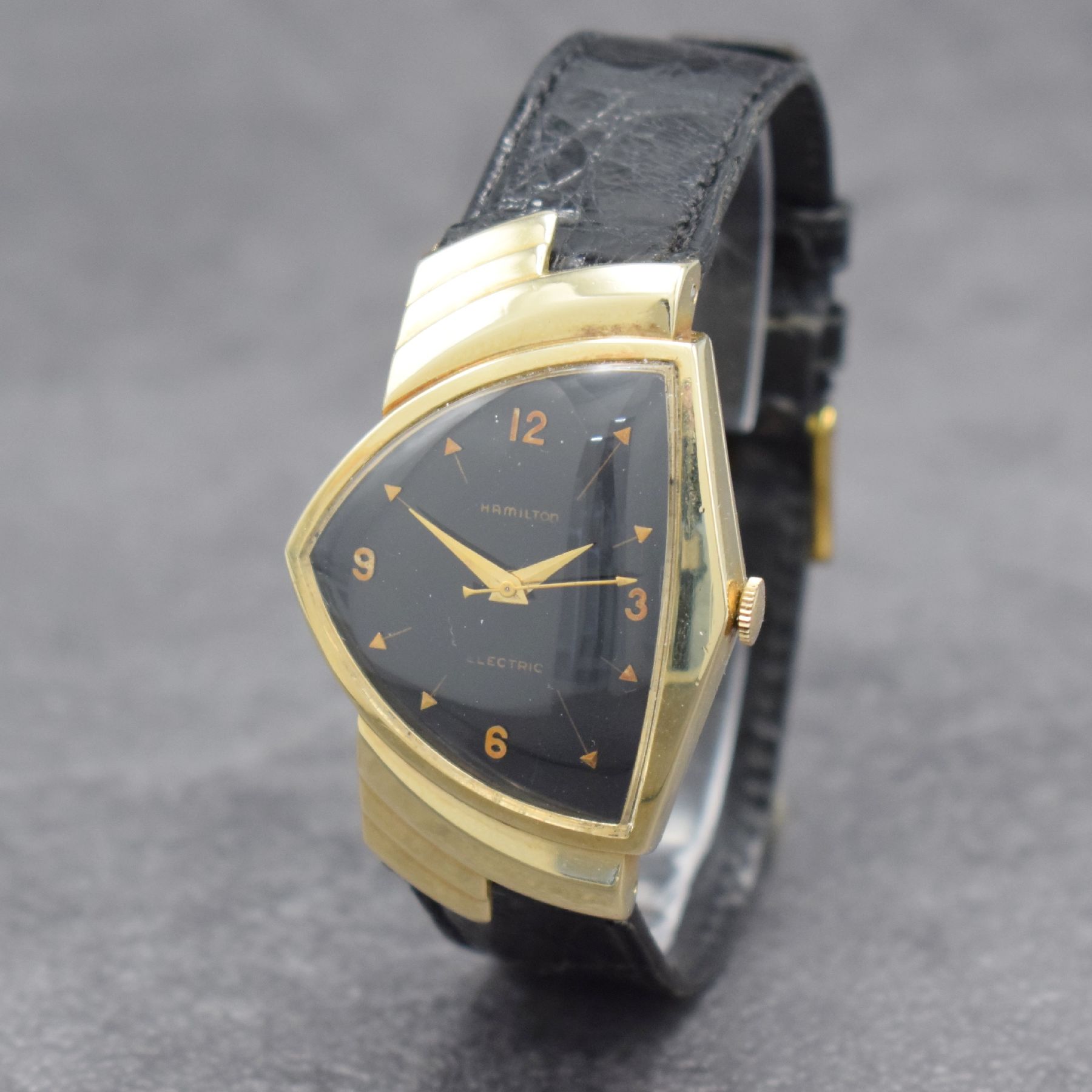 Detail b: HAMILTON ELECTRIC seltene Herrenarmbanduhr in GG 585/000, USA um 1959, asymetrisches Gehäuse, Boden aufgedr., eine der ersten elektromechanischen ...